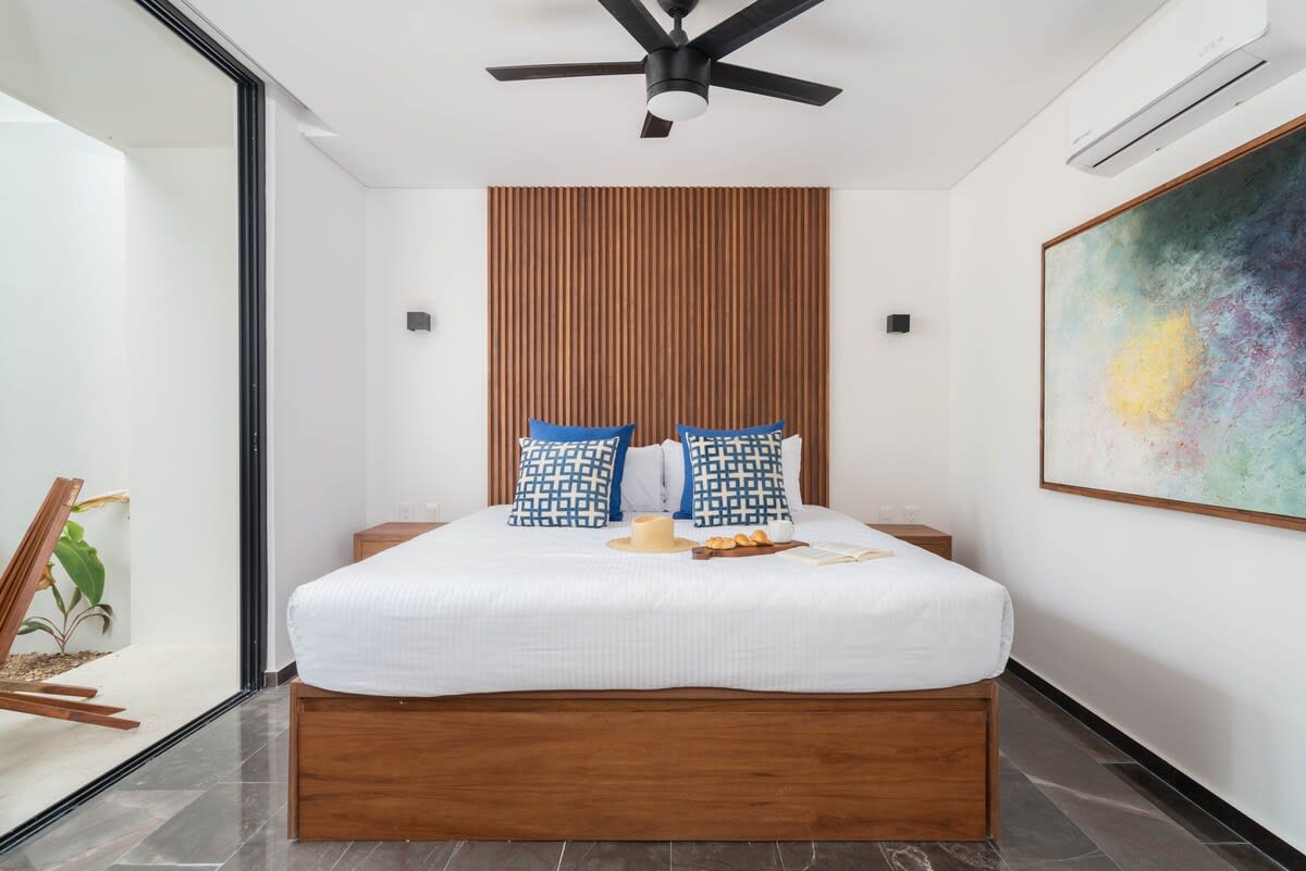 Bedroom #1 / ground floor. Air conditioner, fan, smart tv, terrace.