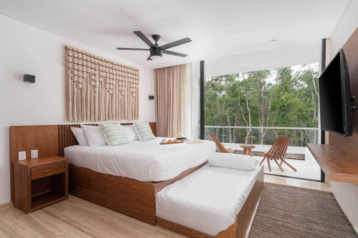 Bedroom #3 / first floor. Air conditioner, fan, smart tv, terrace, en suite bathroom.