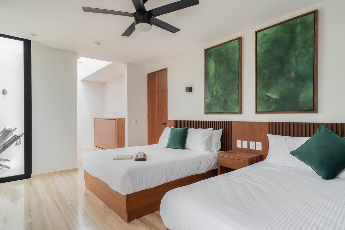 Bedroom #4 / first floor. Air conditioner, fan, smart tv, terrace.