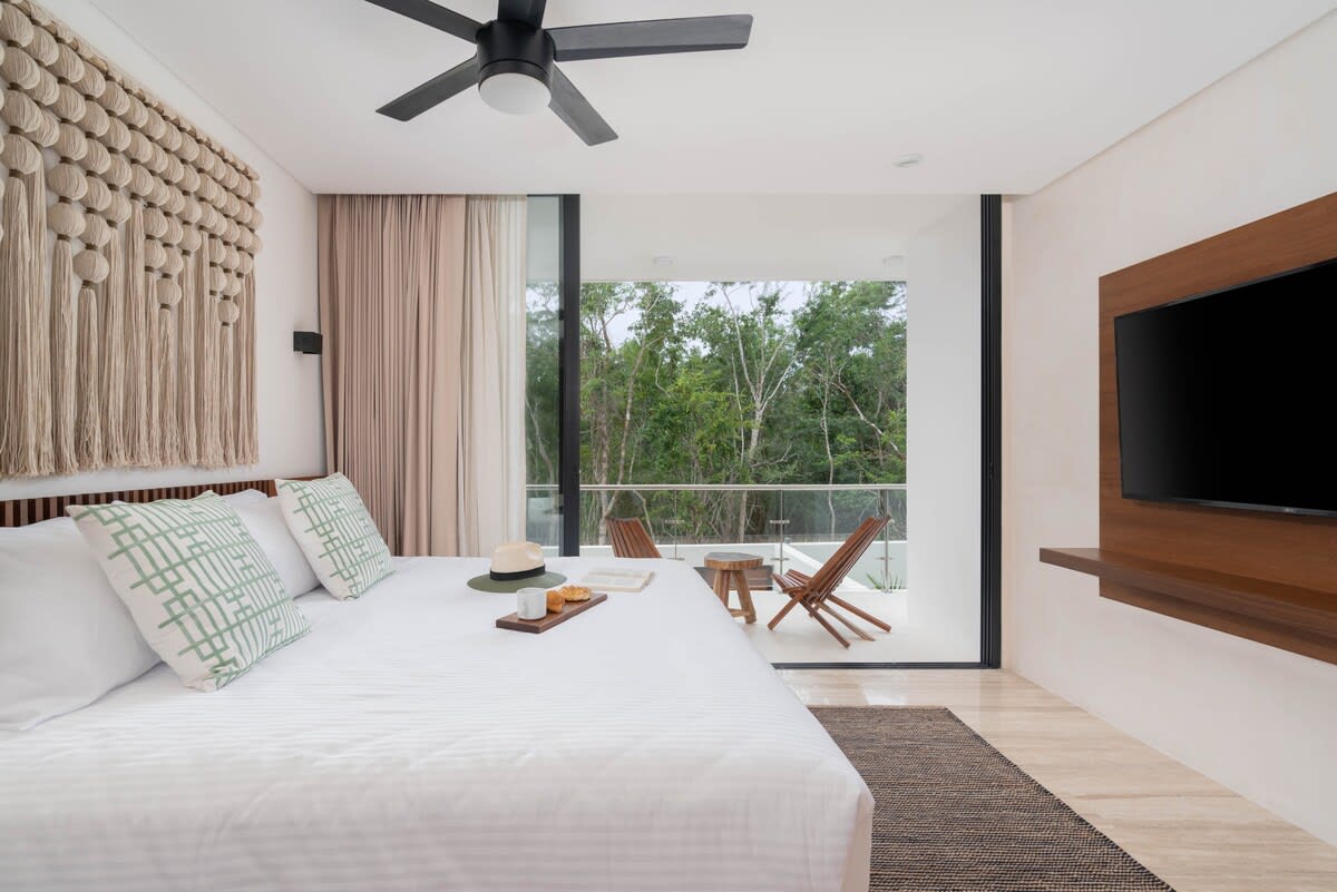 Bedroom #3 / first floor. Air conditioner, fan, smart tv, terrace, en suite bathroom.