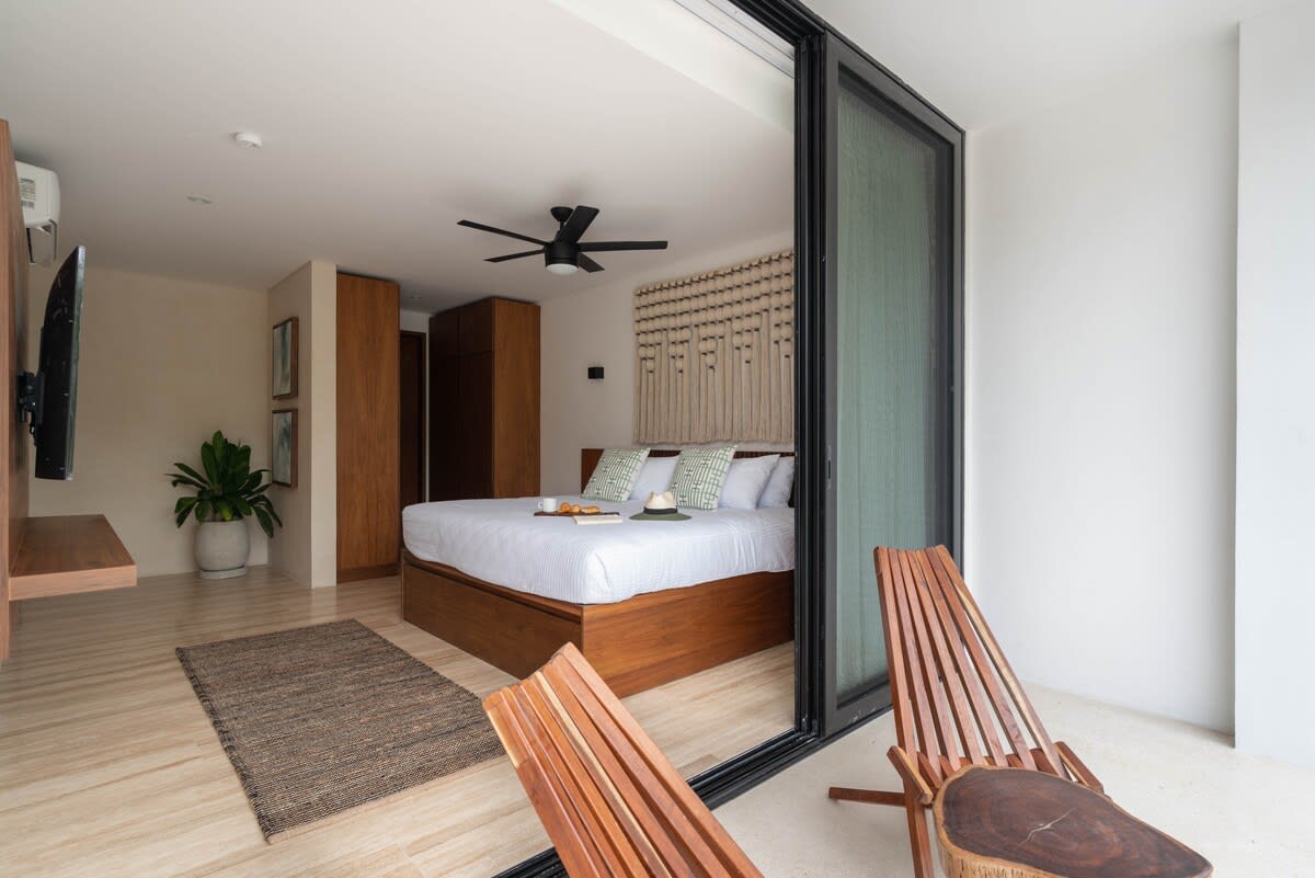 Bedroom #3 / first floor. Air conditioner, fan, smart tv, terrace, en suite bathroom.