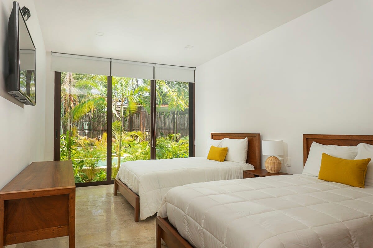 Bedroom #2 (2 double beds)  / fan, air conditioner, tv