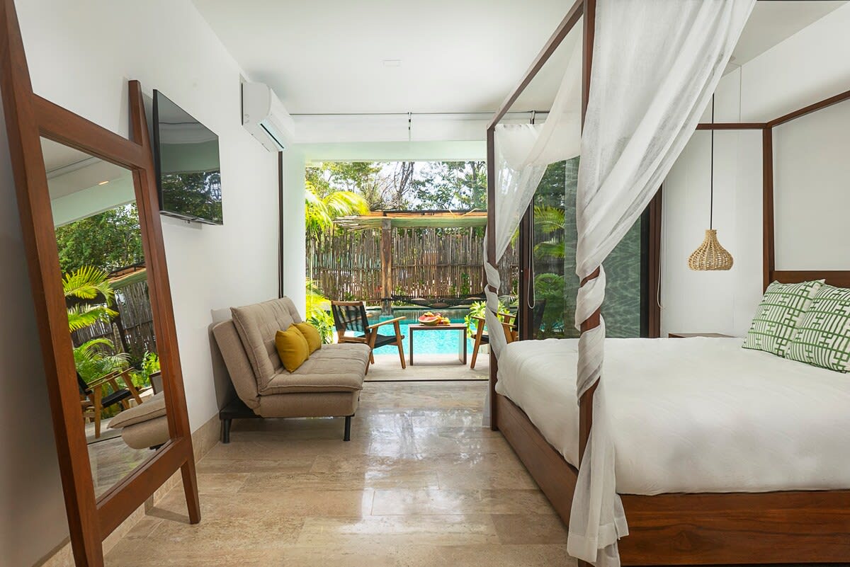 Master bedroom with direct access to the pool