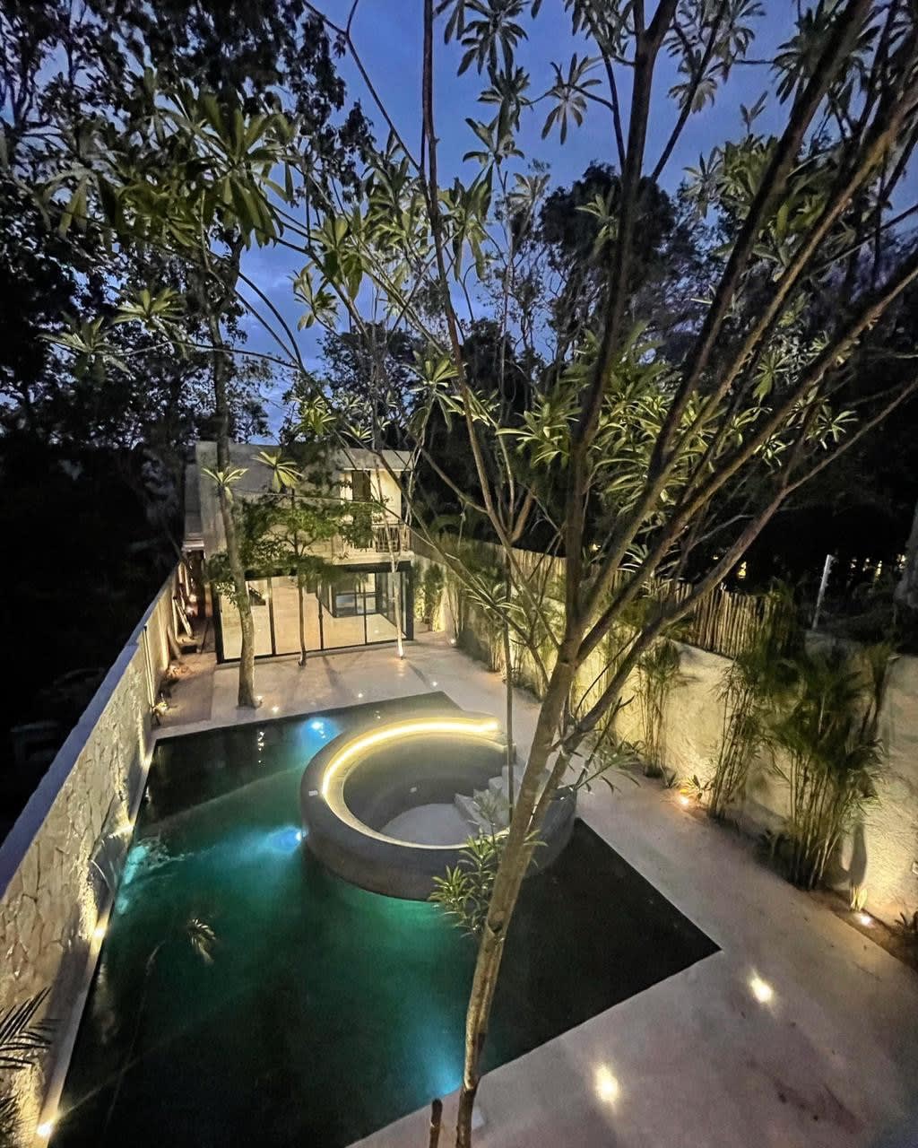 View from second building to the pool and main house.