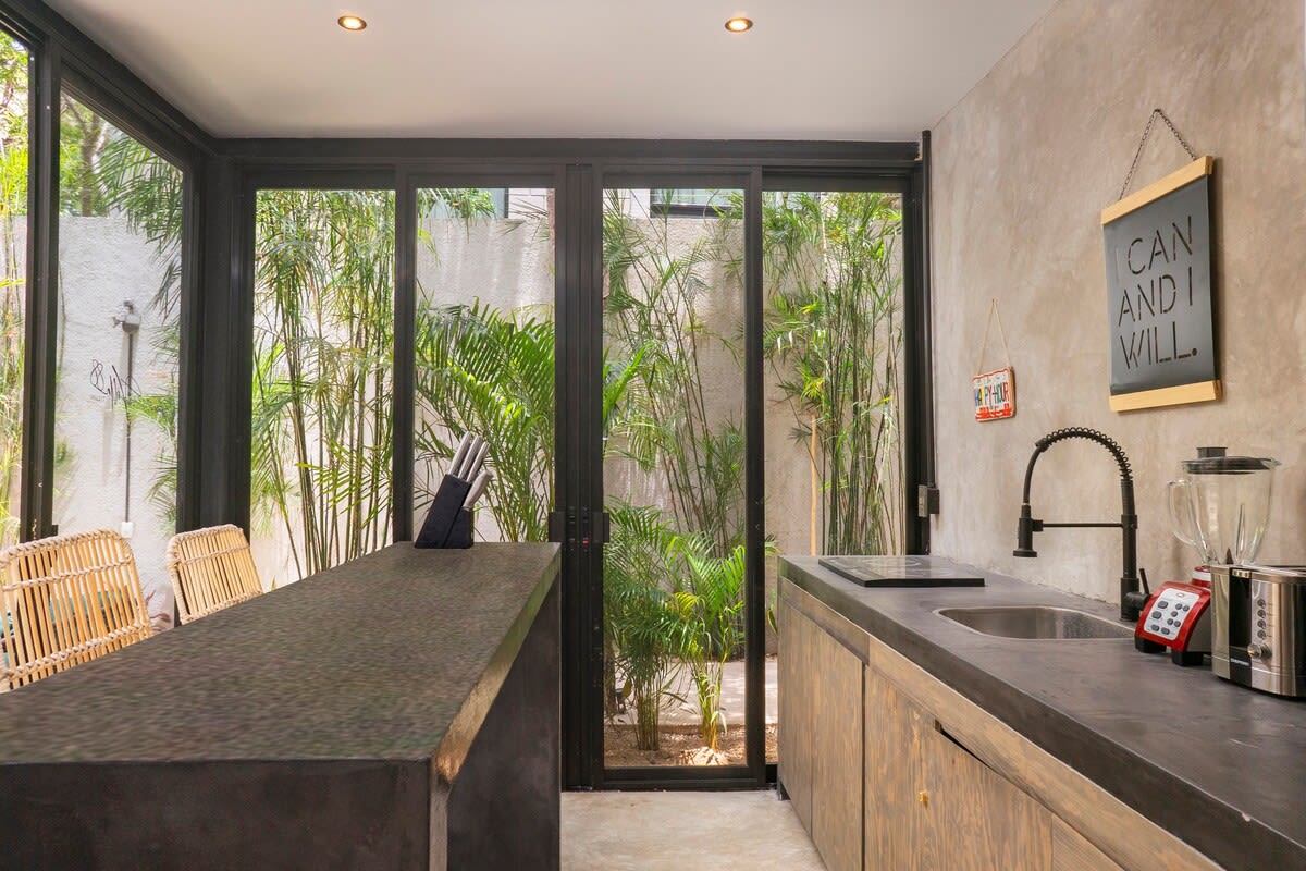 Building 2 - First floor with another kitchen and view to the pool