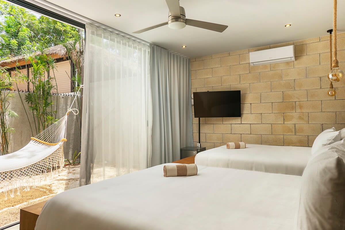 First floor - Room #1 with 2 beds and outdoor space with hammock