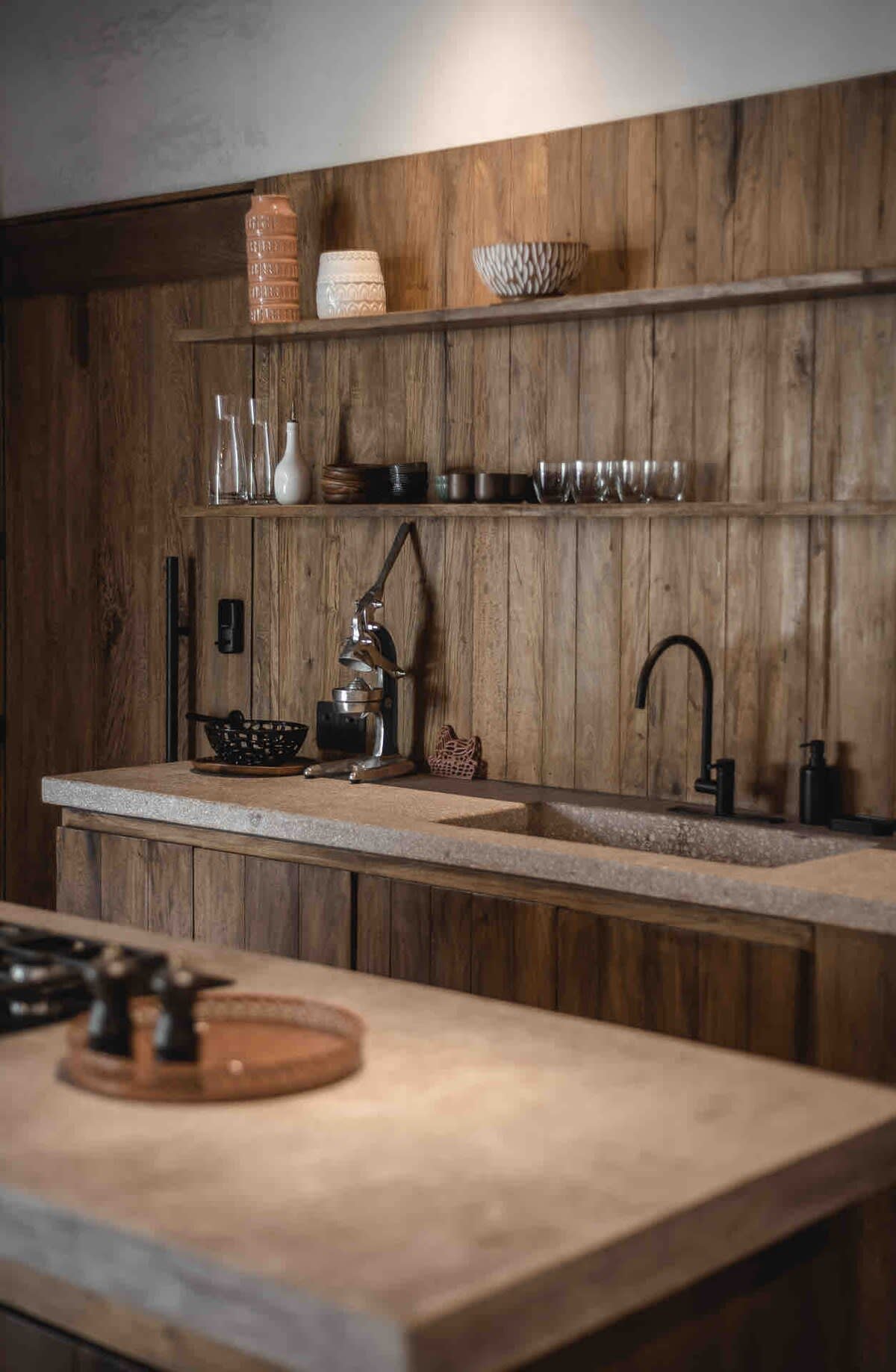 Fully equipped kitchen with wooden finishes.
