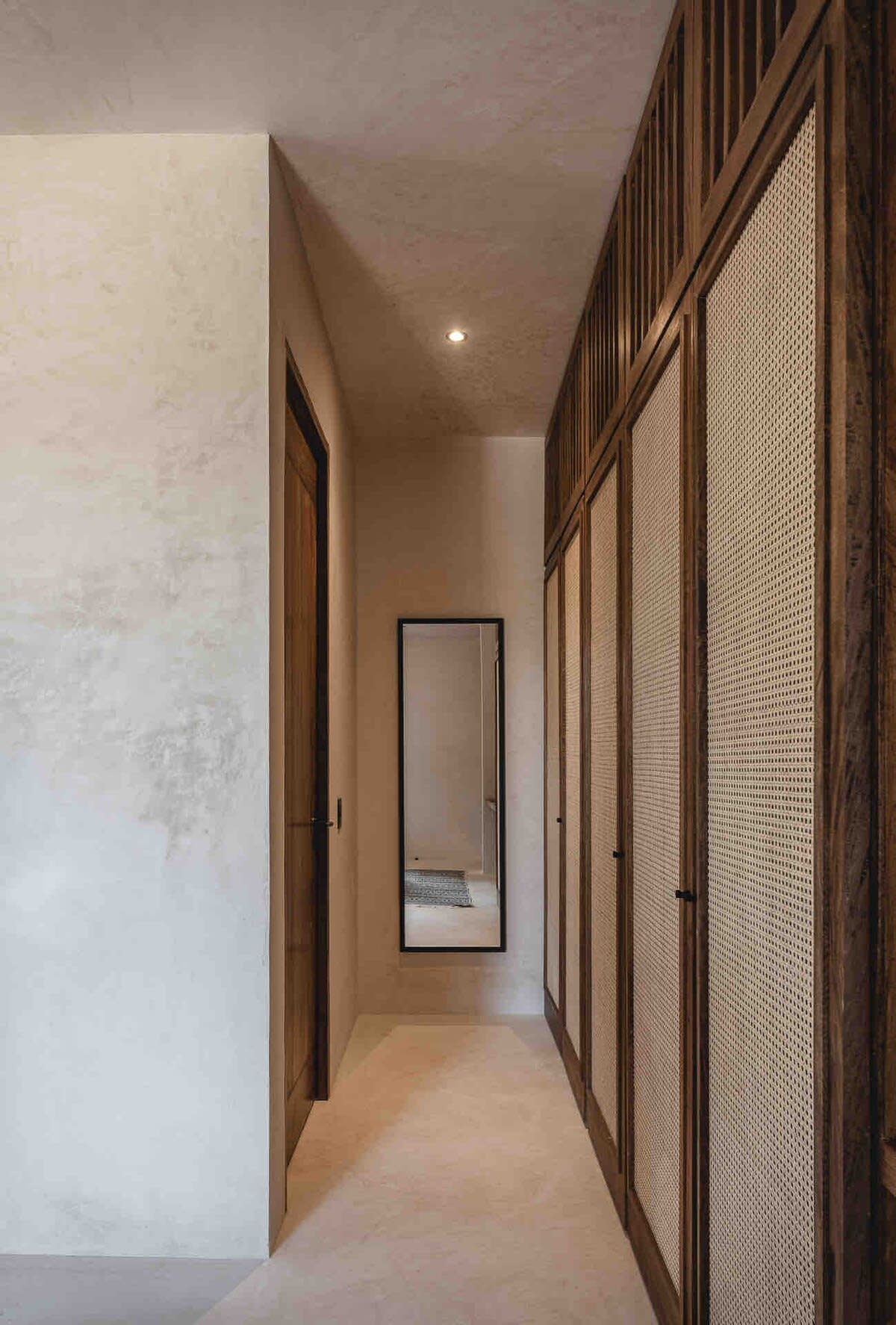 Full closet storage leading to ensuite bathroom 