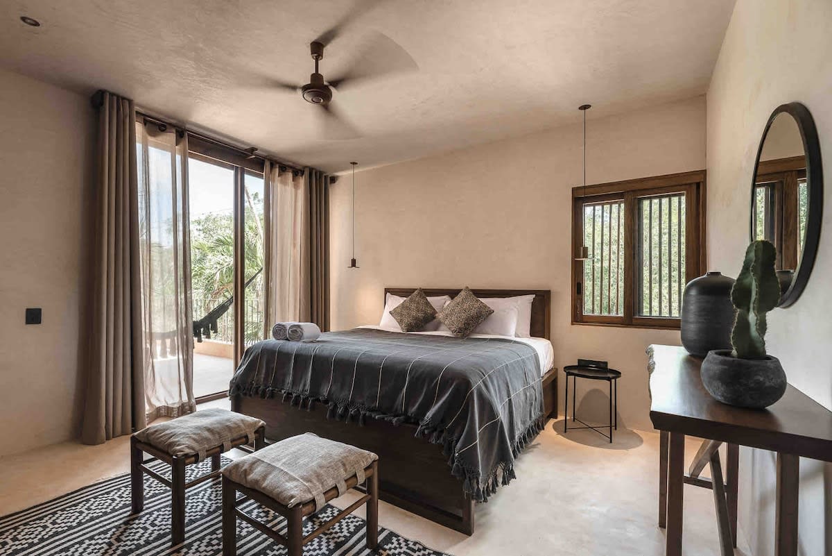 Bedroom 2, with private balcony access and ensuite bathroom