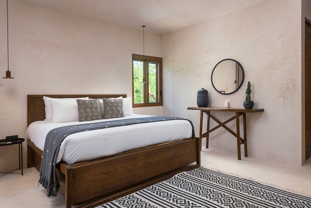 Bedroom 2, on the second floor, with ensuite bathroom and patio access