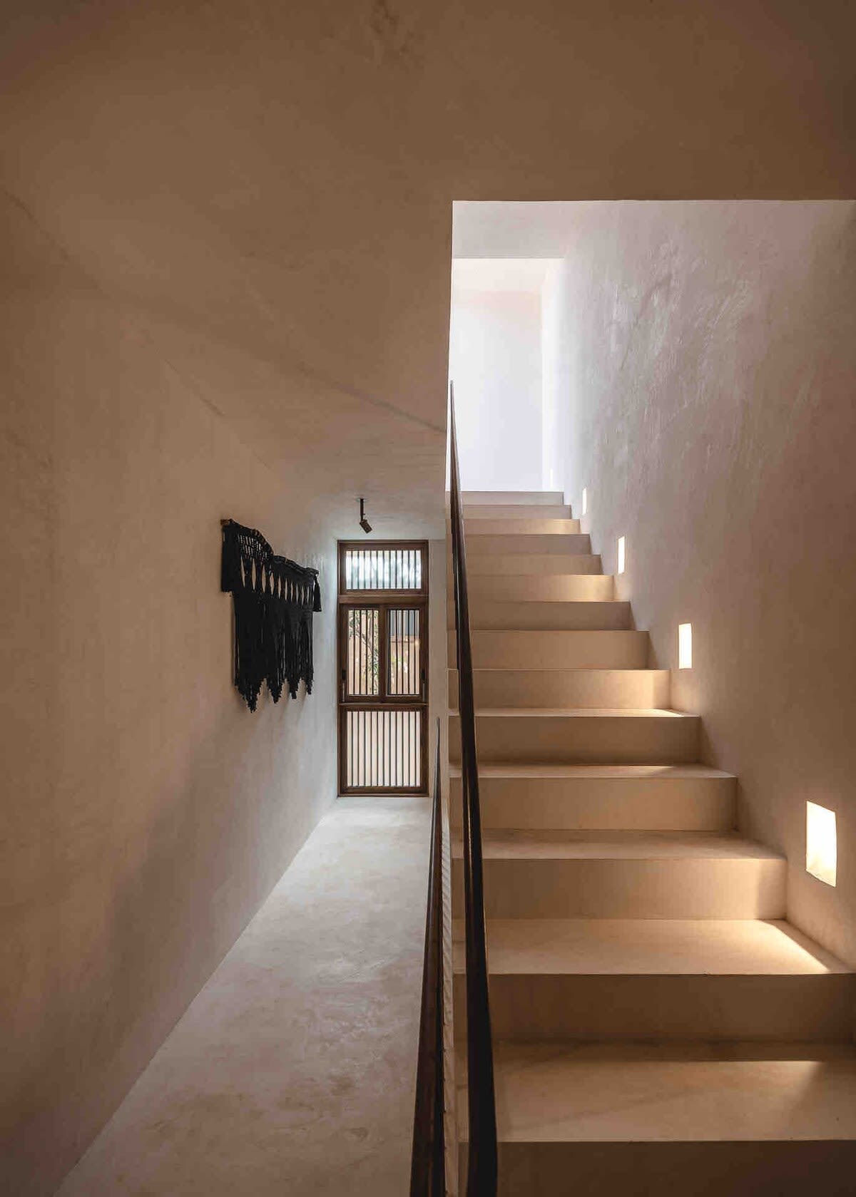 Stairs to the third floor/rooftop.