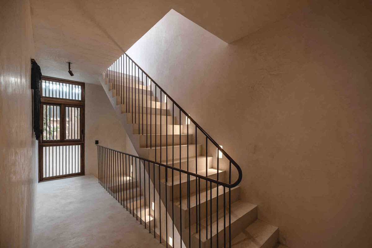 Stairs to the third floor/rooftop.