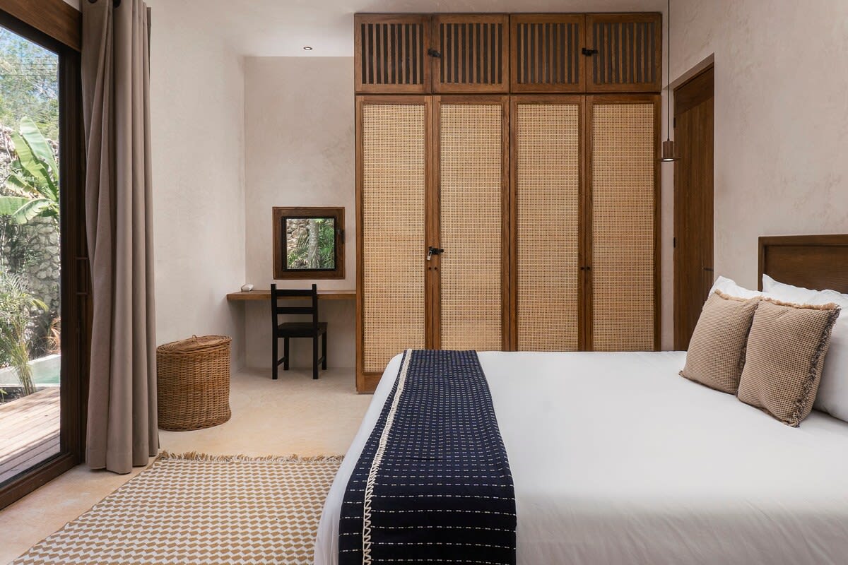 Main floor bedroom with dedicated workspace