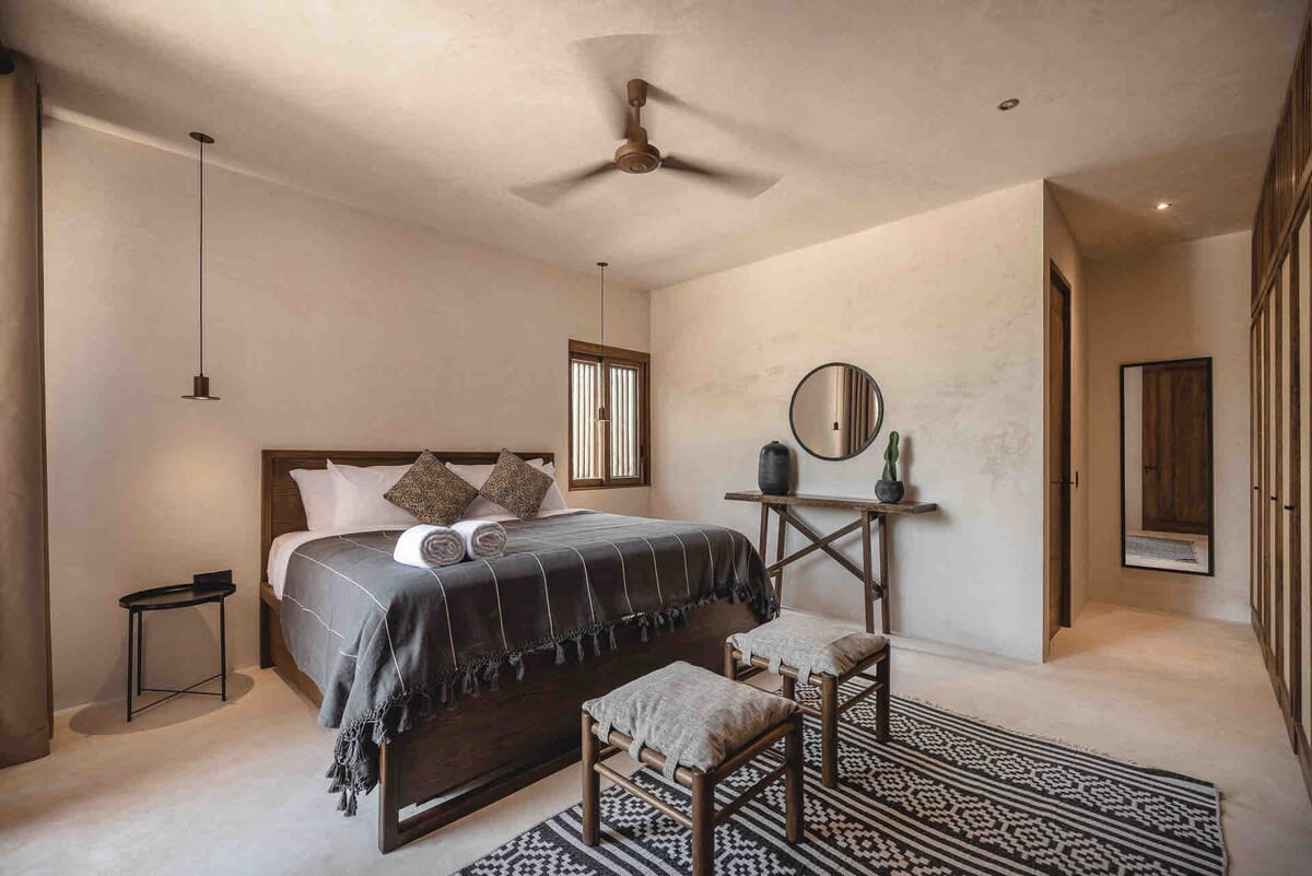 Bedroom 2, on the second floor, with ensuite bathroom and patio access