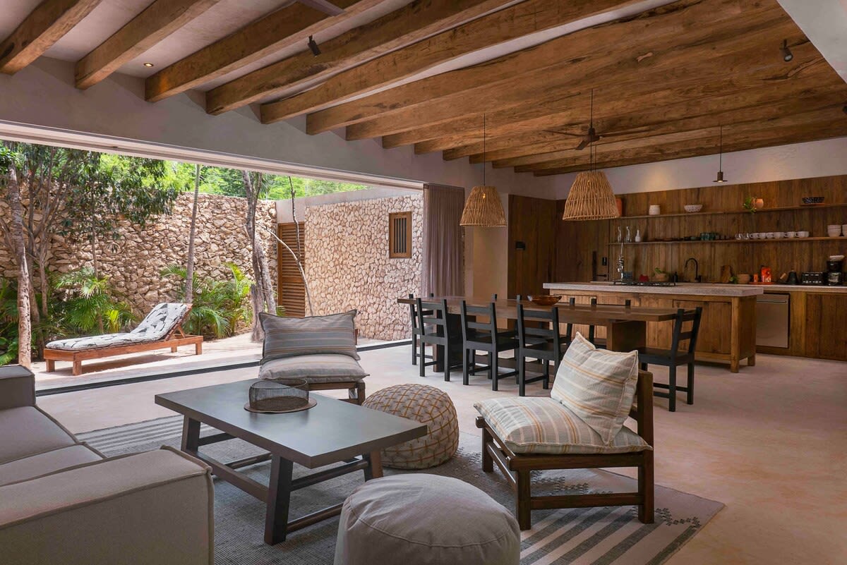 Open-concept living area with views of the private patio.