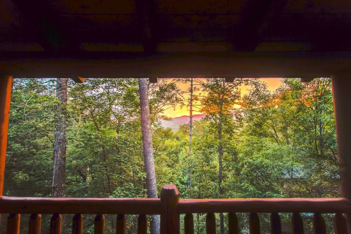 Sunset over the Smoky Mountains ridgeline — the layered blue peaks the mountains are named for