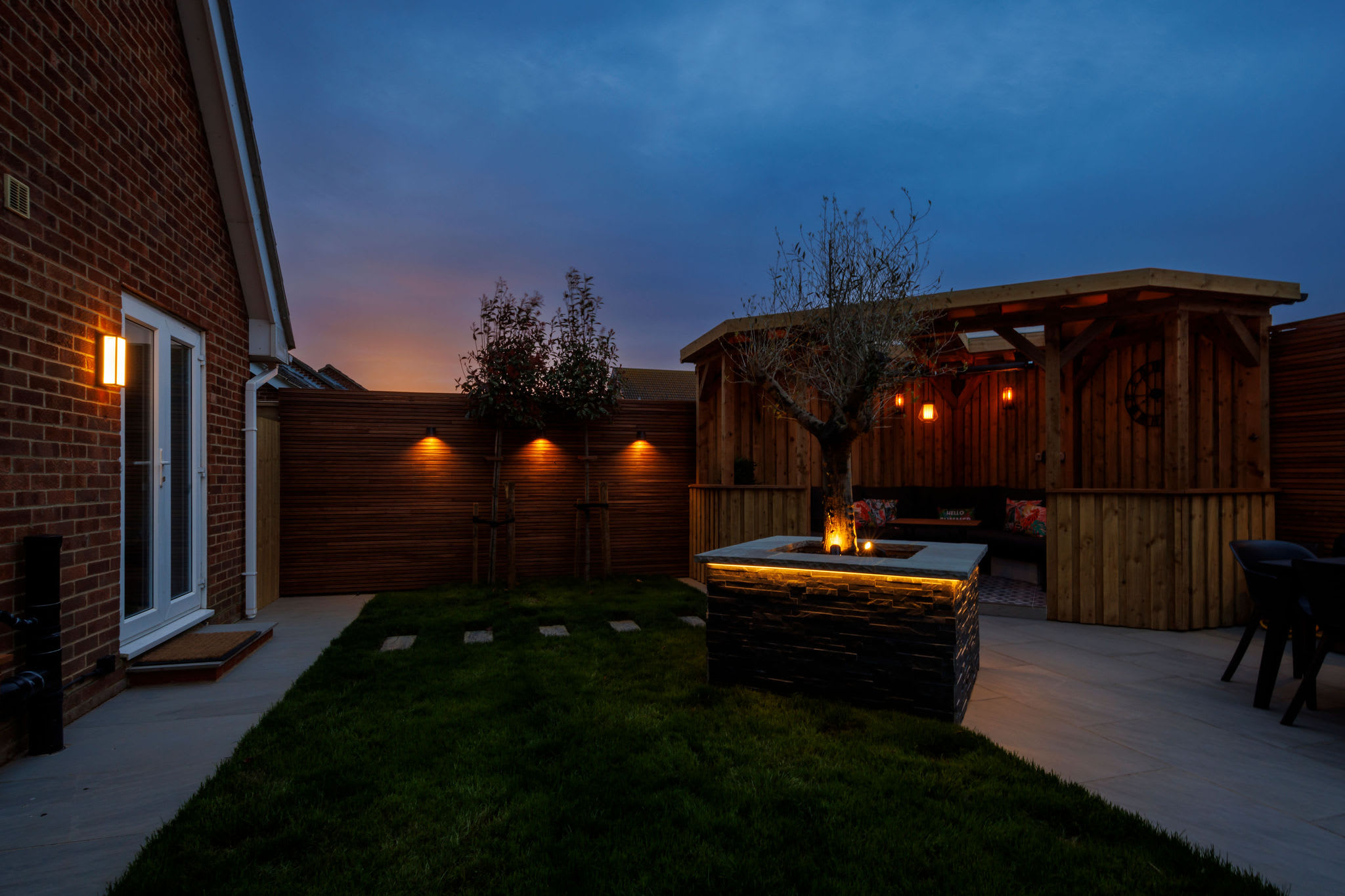 As the sunsets, the outdoor area's gentle lighting creates a beautiful space to socialise.