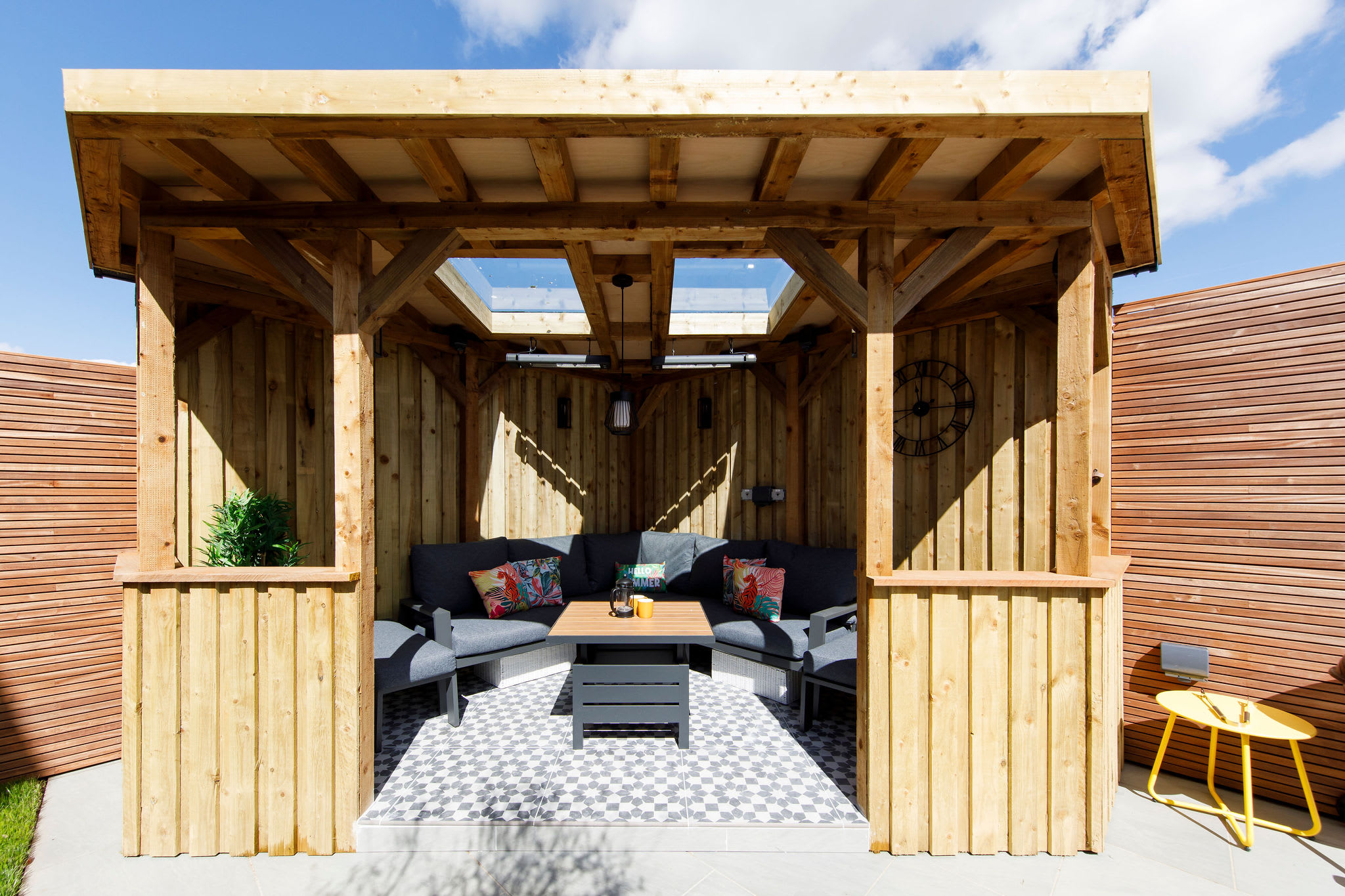 The outdoor are vastly extends the living space of this home, giving area to relax, eat and unwind away from the main house.