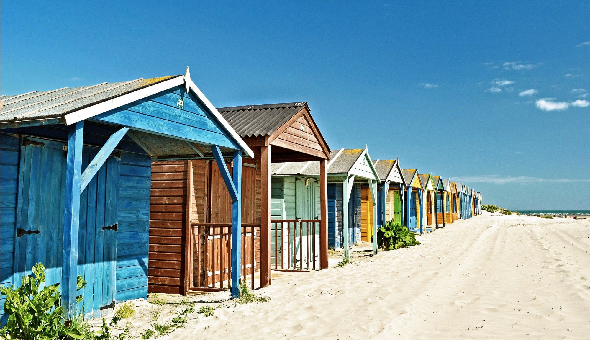 The beach huts on West Witterings golden sands