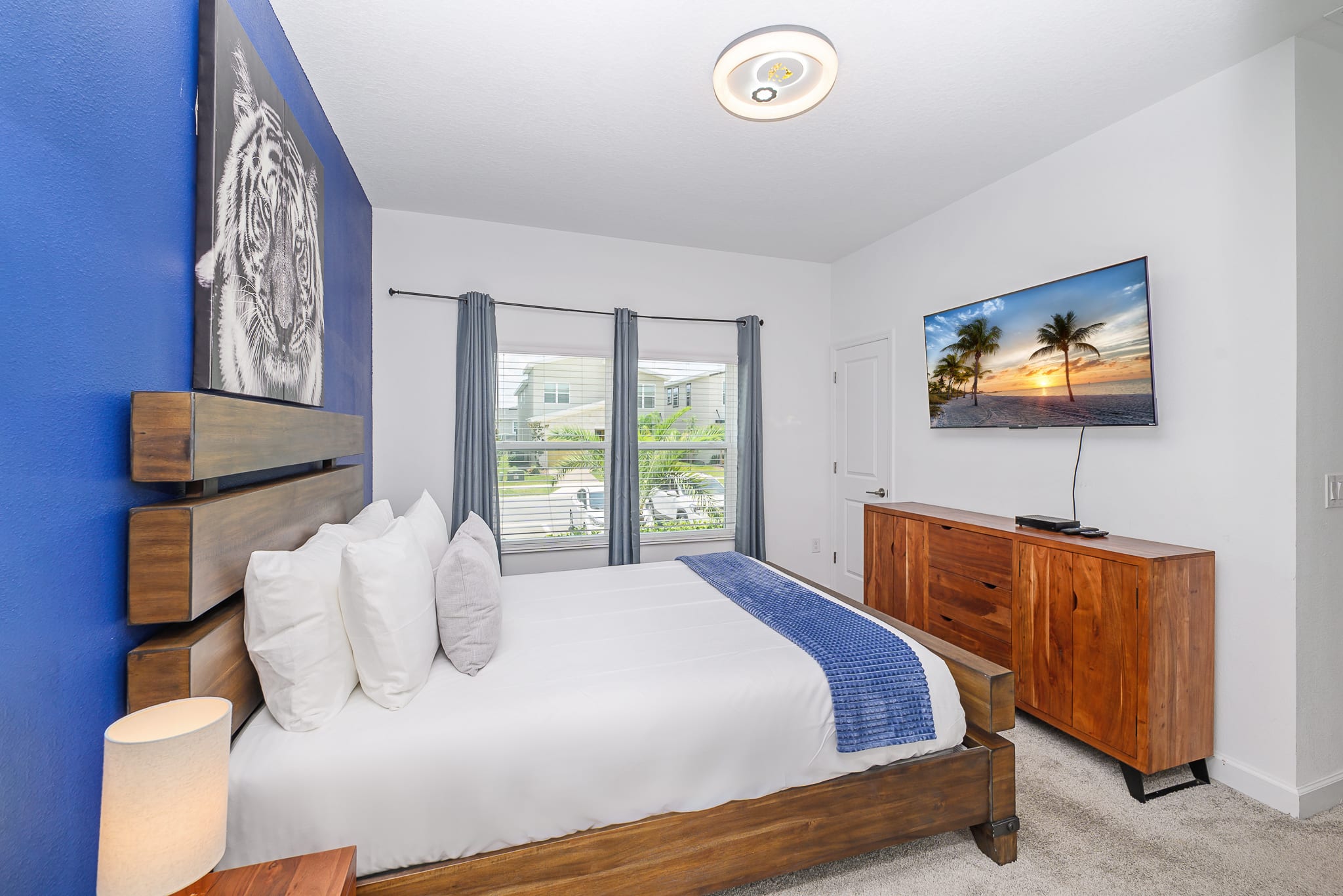 Wake Up To Natural Light In This Lovely Queen Bedroom
