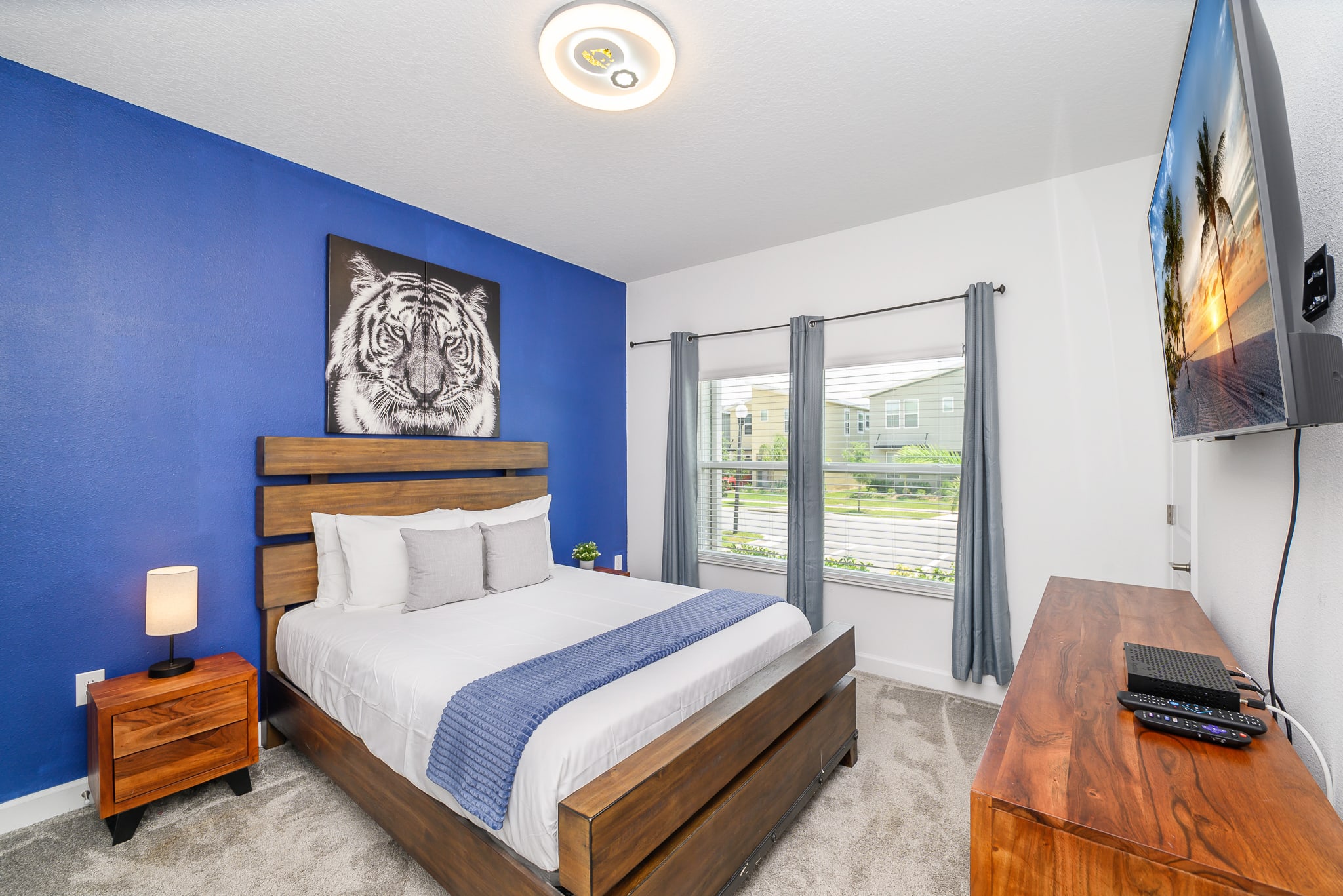 Relax In This Spacious Queen Bedroom With Elegant Decor