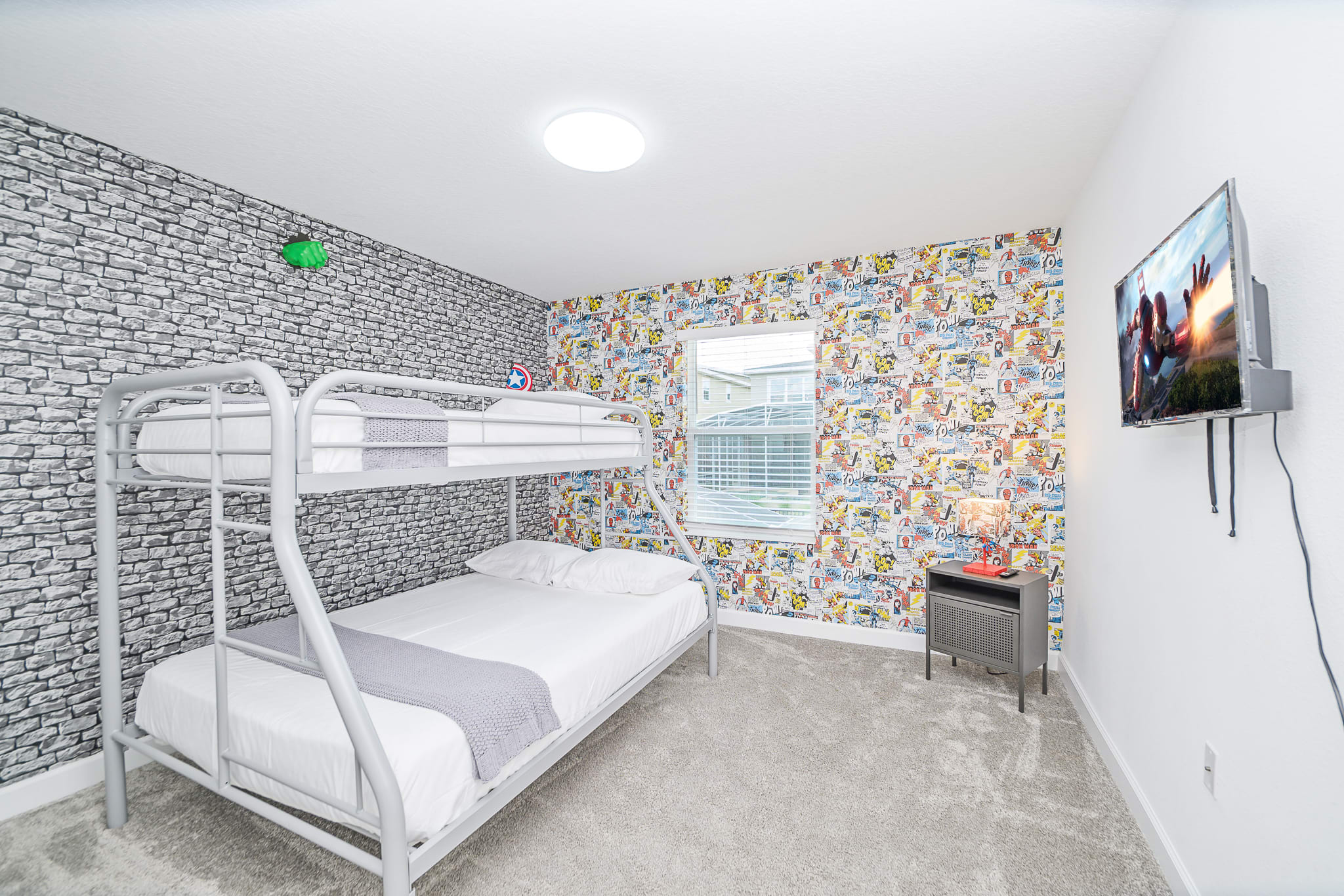 Playful Bunk Bedroom With Full And Twin Beds Featuring Whimsical Decor