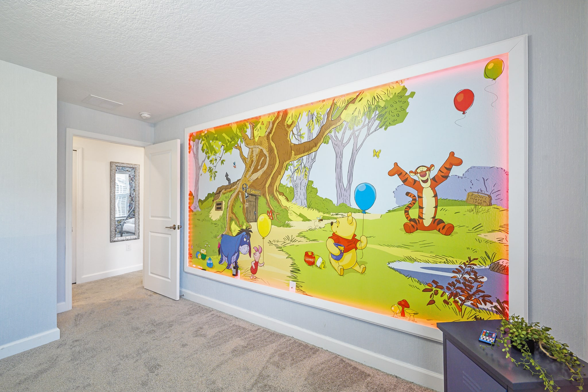 Bright Hallway Leading To Themed Bedrooms With Fun Wall Accents