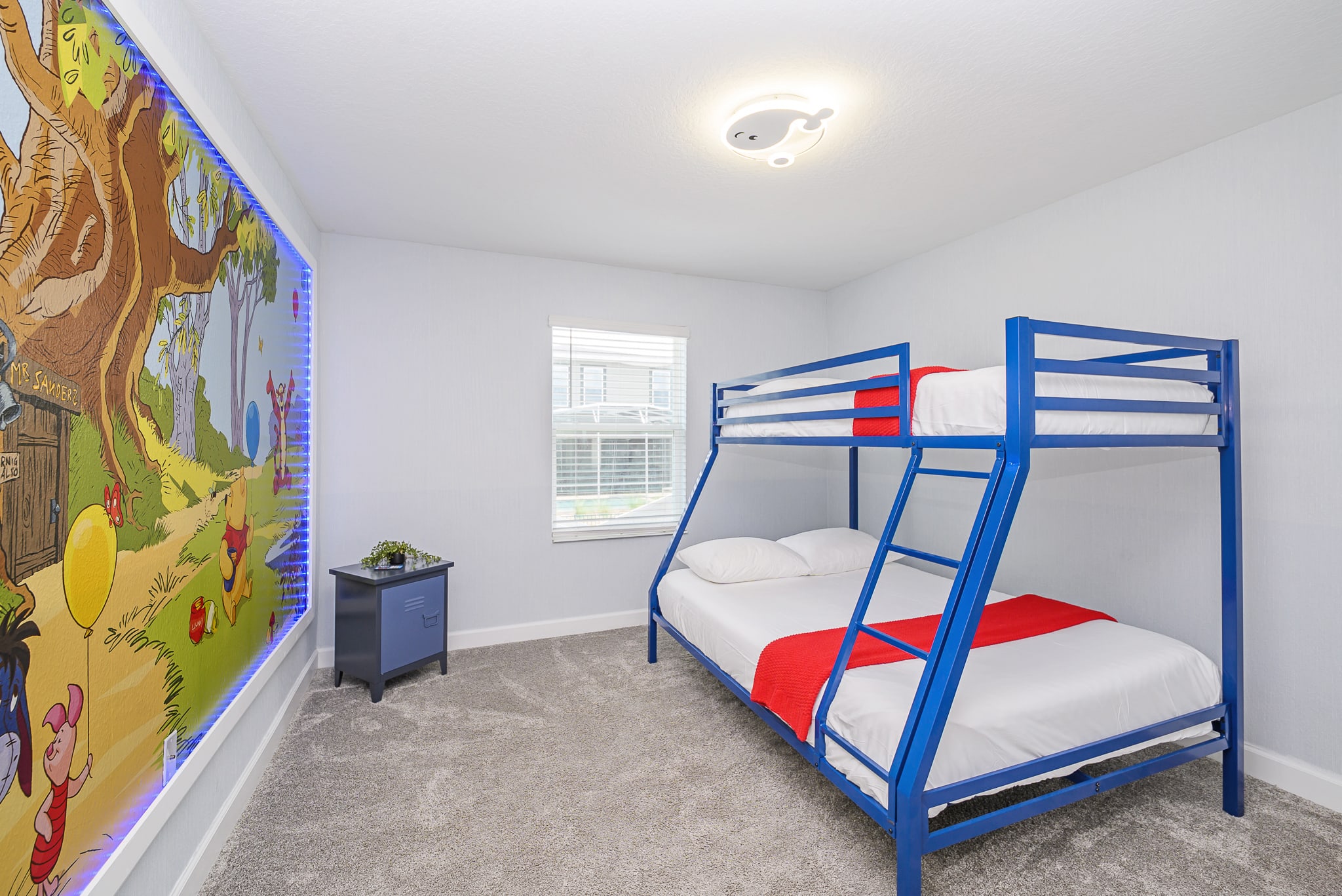 Cheerful Bedroom With Twin Over Full Bunk Bed And Playful Mural Decor