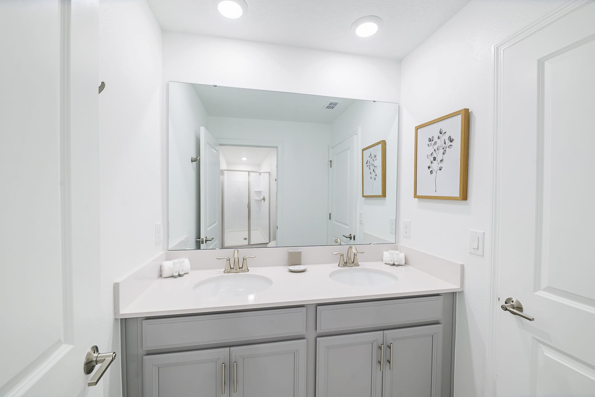 Elegant Bathroom With Double Vanity And Spacious Walk-In Shower