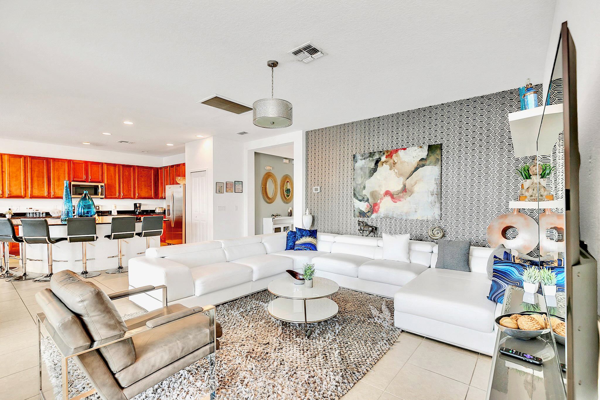 Modern Living Room With Plush Seating And Smart TV