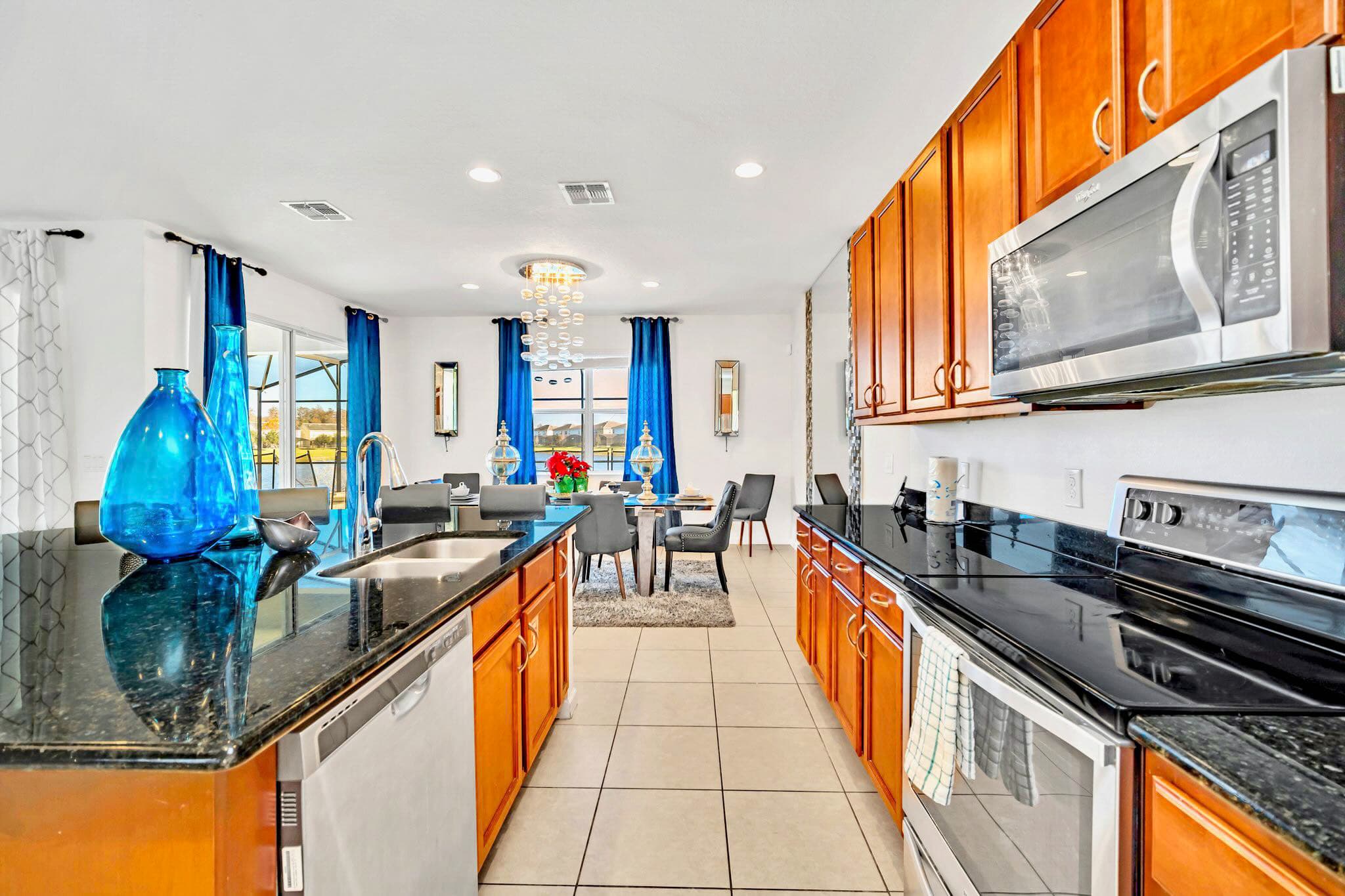 Fully Equipped Kitchen With Granite Countertops And High-End Appliances