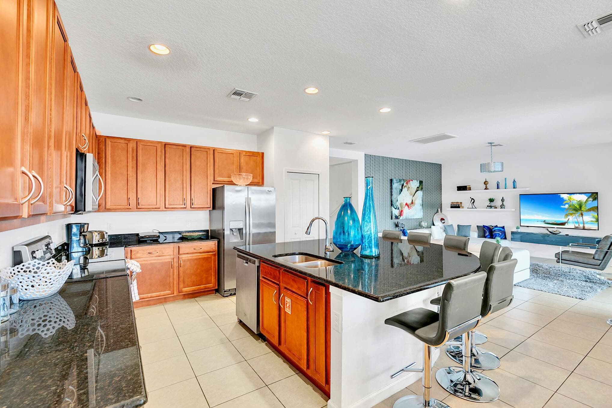Sleek And Stylish Kitchen With Stainless Steel Appliances