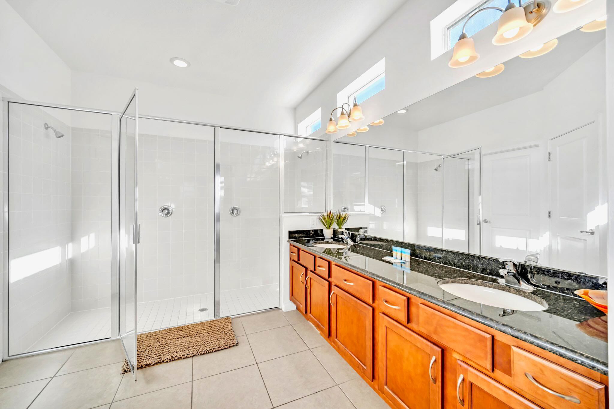 Modern Bathroom With Dual Sinks And Walk-In Shower