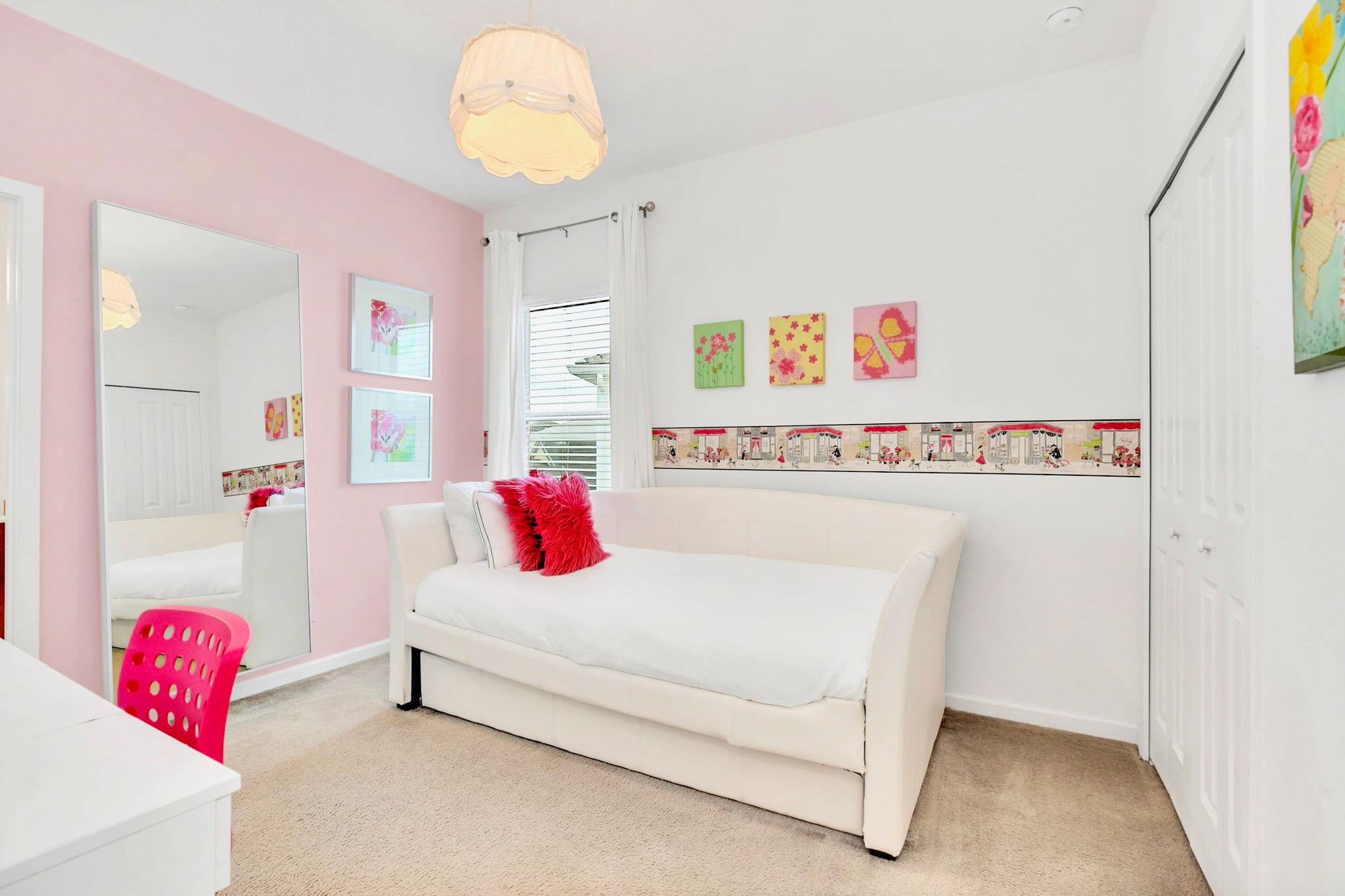 Fun And Vibrant Kids' Room With Playful Decor And A Single Bed