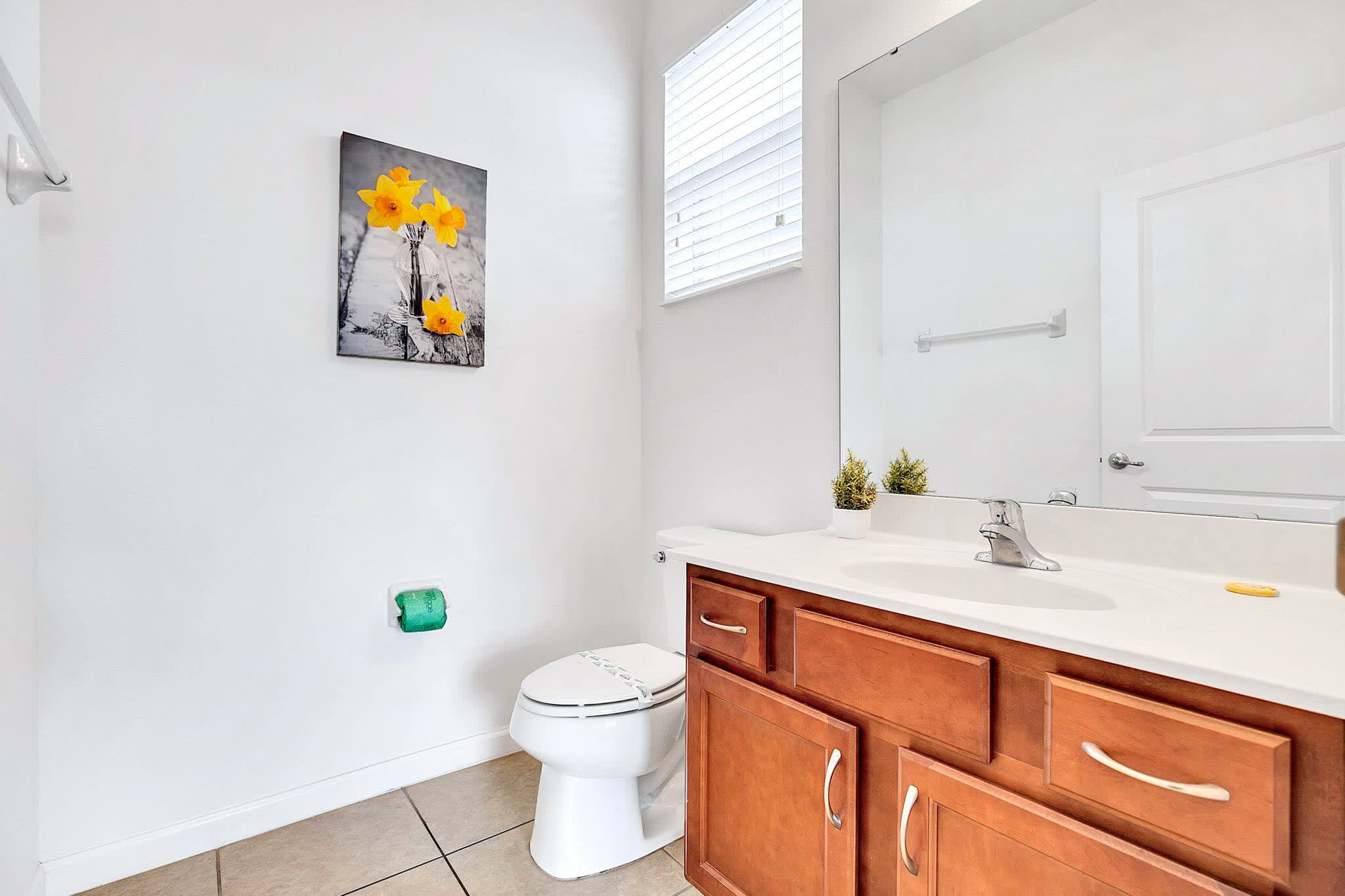 Minimalist Bathroom Featuring Elegant Fixtures And Soft Tones