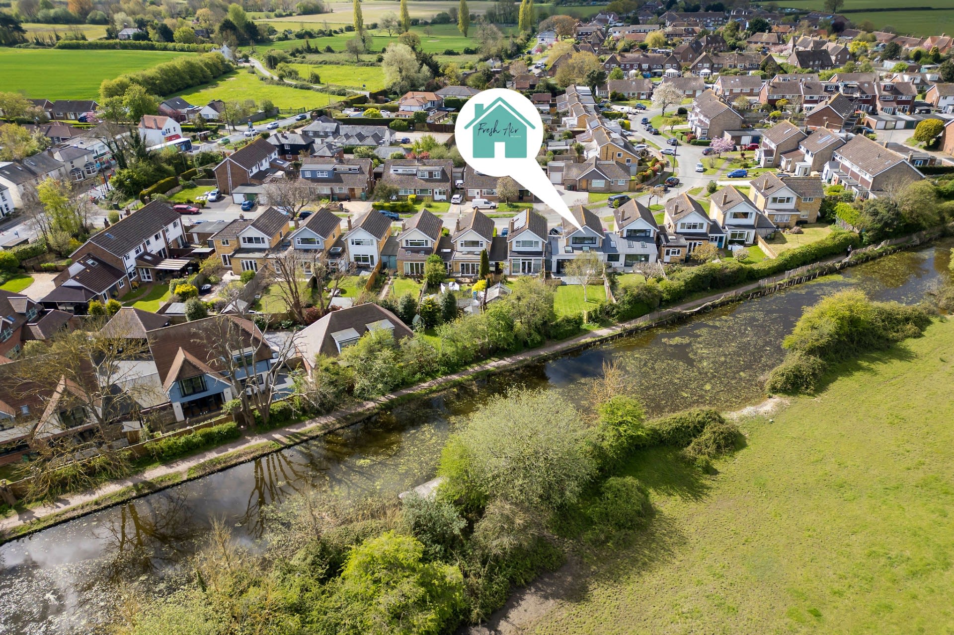 The house is set along Chichester's scenic canal, with direct access from the back garden.