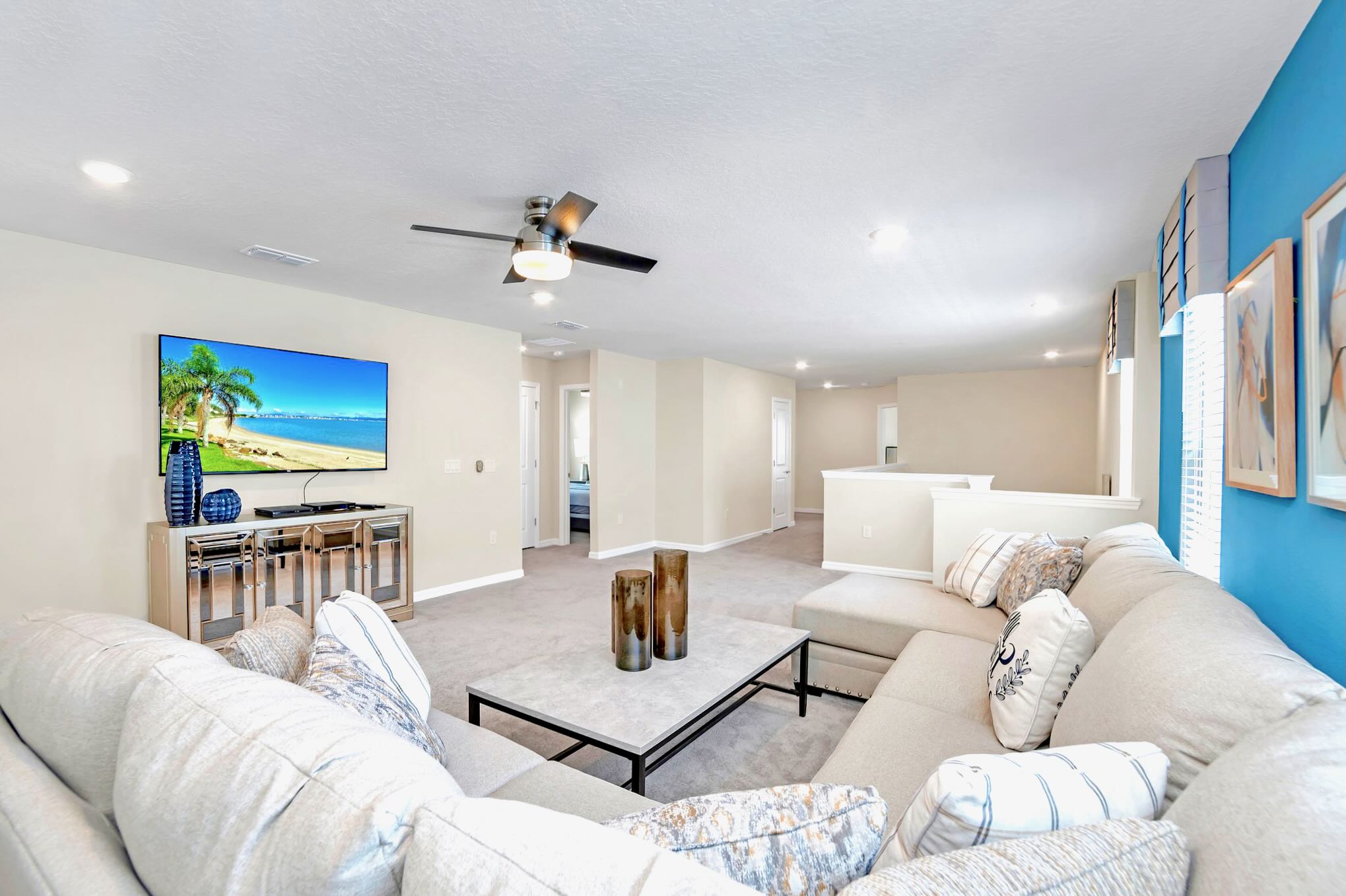 Open Living Room With Comfortable Seating And Smart TV