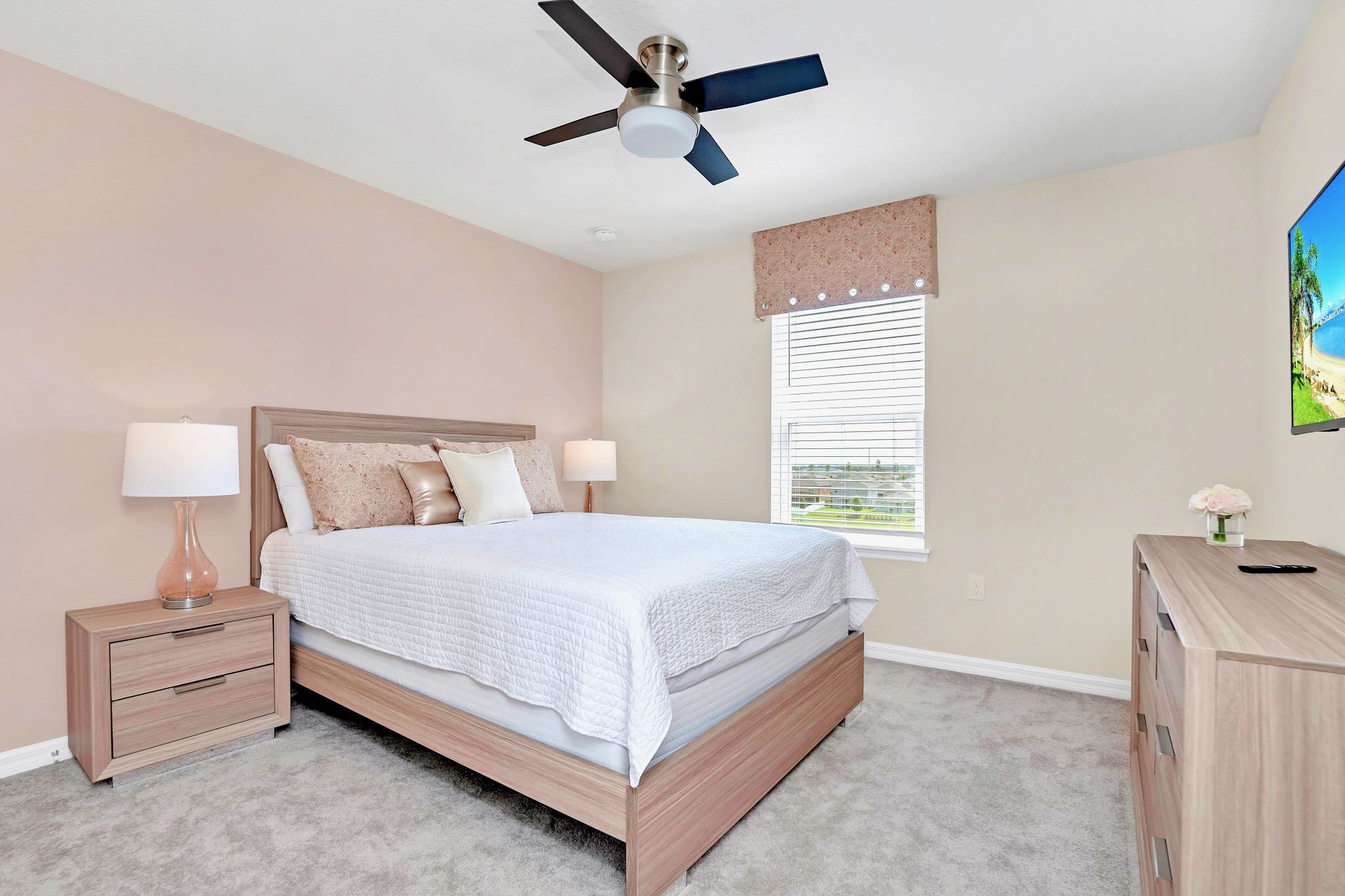 Warm And Inviting Queen Bedroom With Ample Space