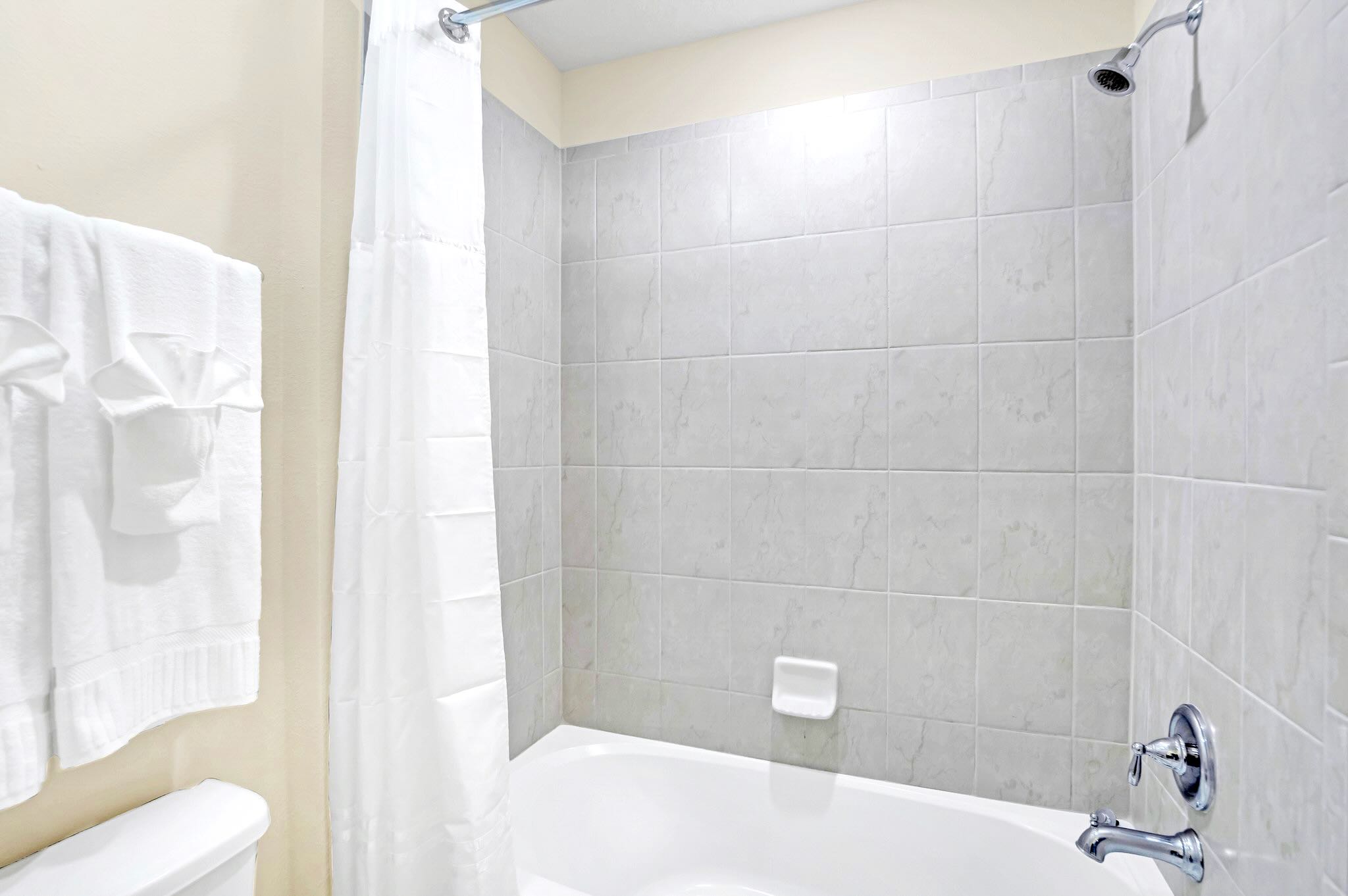 Spacious Ensuite With Premium Finishes And Relaxing Bath