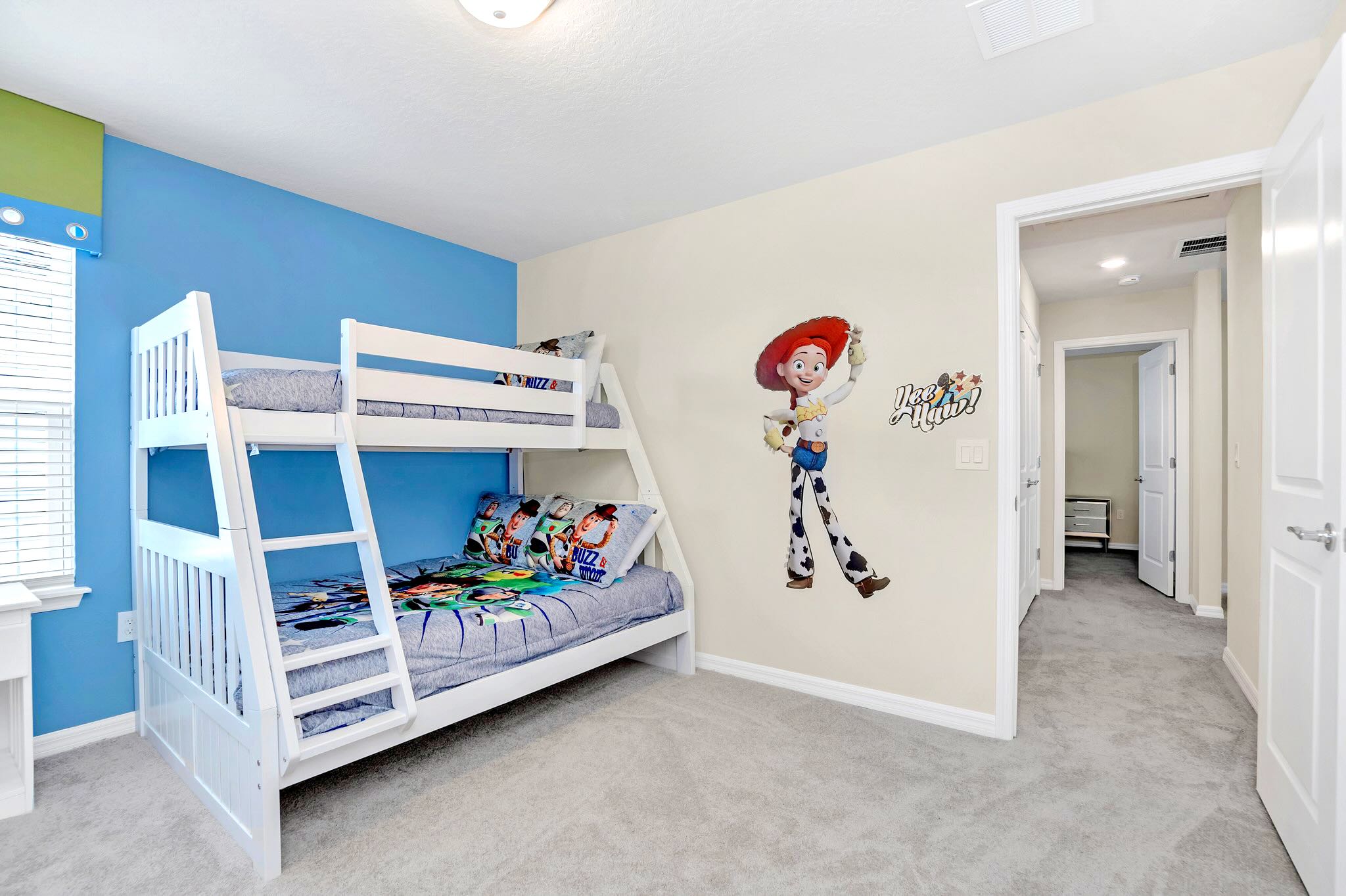 Themed Bunk Bedroom With Toy Story Decor And Ample Space