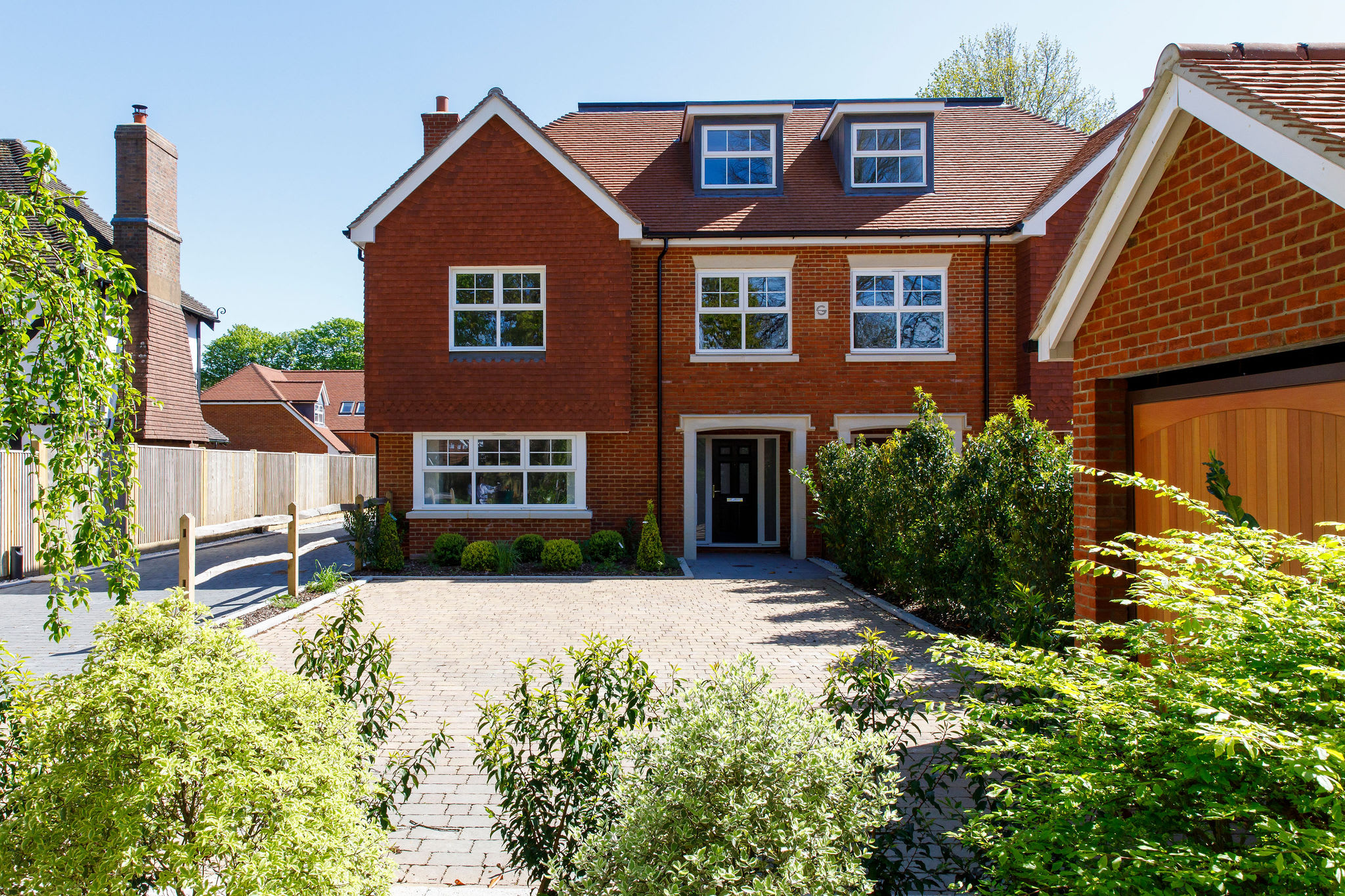 The home is newly build, with a pristine outdoor area and ample parking.