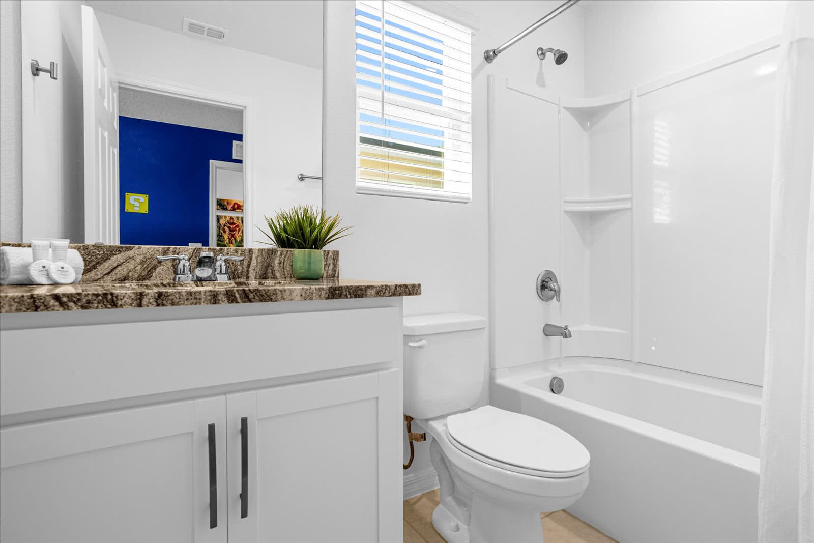Kids Bathroom with Combined Bathtub and Shower