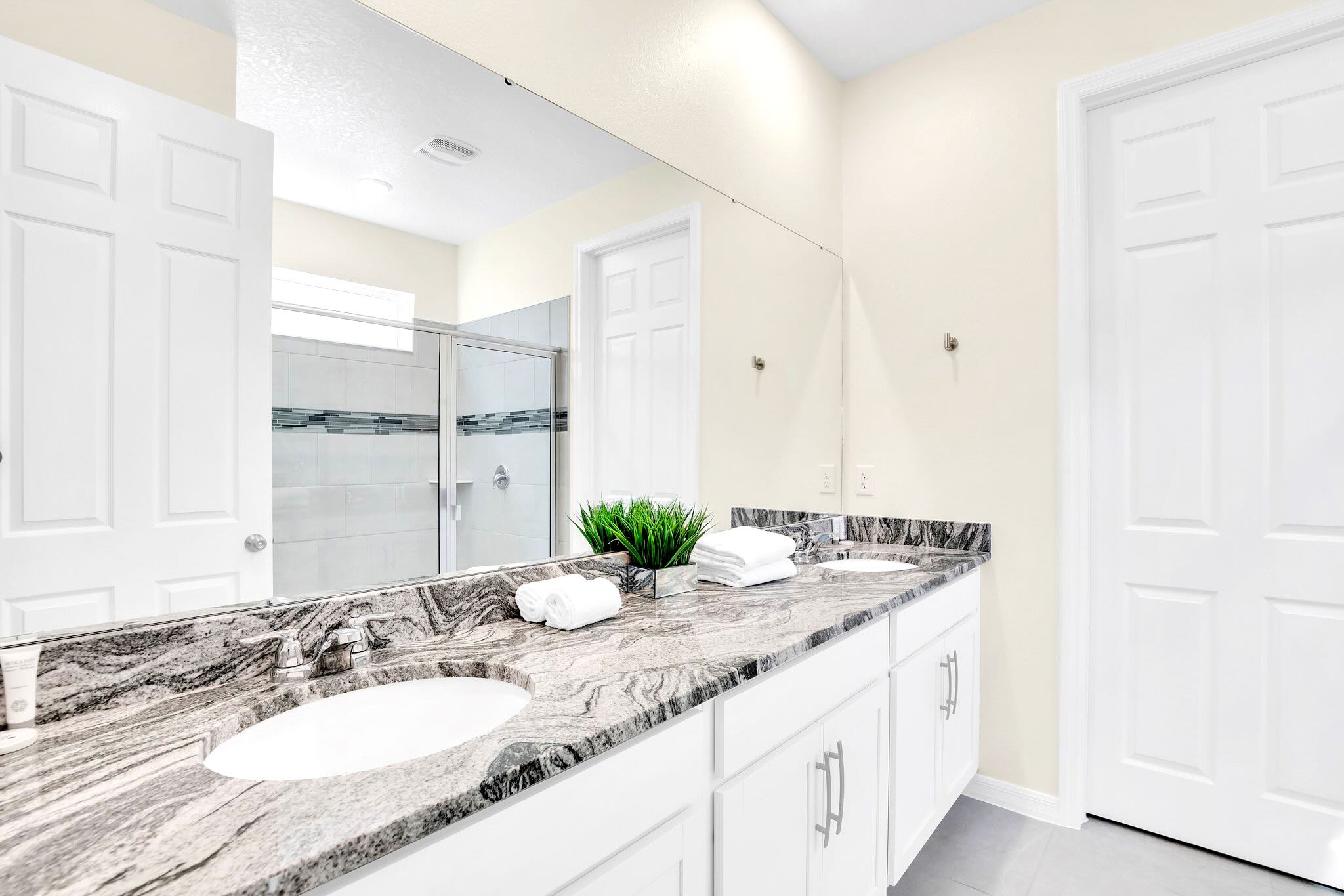 En-Suite Bathroom with Double Vanity and Standing Shower