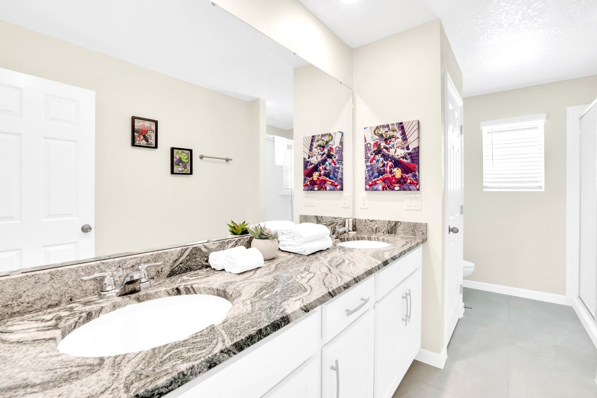 Spacious En-Suite Bathroom with Double Vanity and Shower