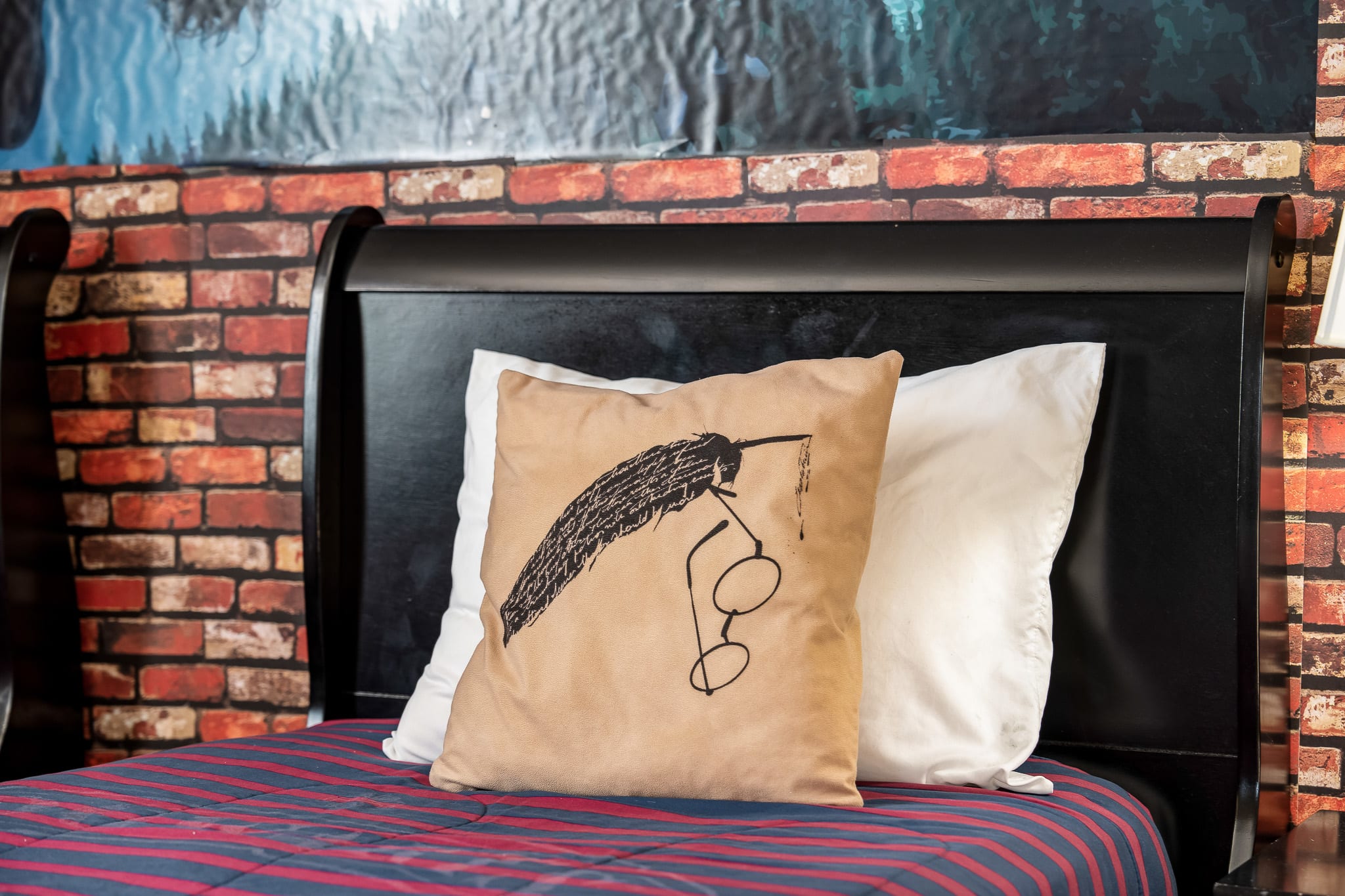 Close-up of detailed bedding adding a playful touch to the room.
