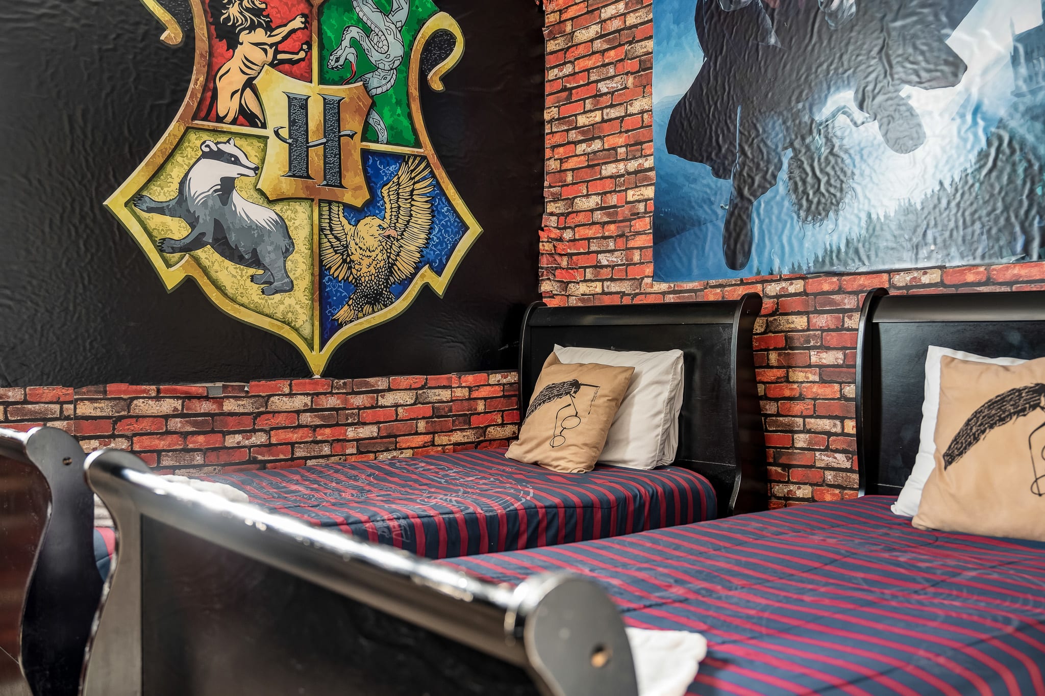 Another themed bedroom w/ vibrant artwork and cozy sleeping setup.