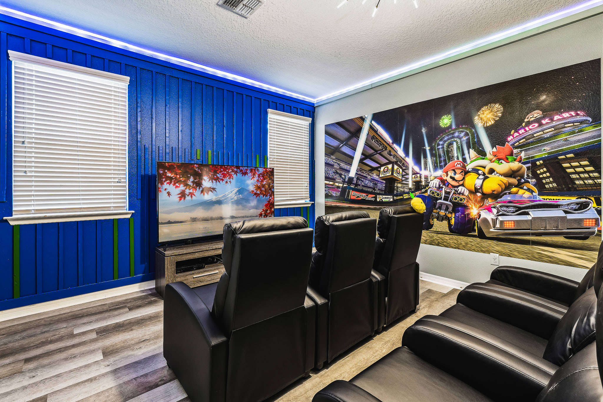 Home theater setup w/ tiered seating for immersive movie experiences