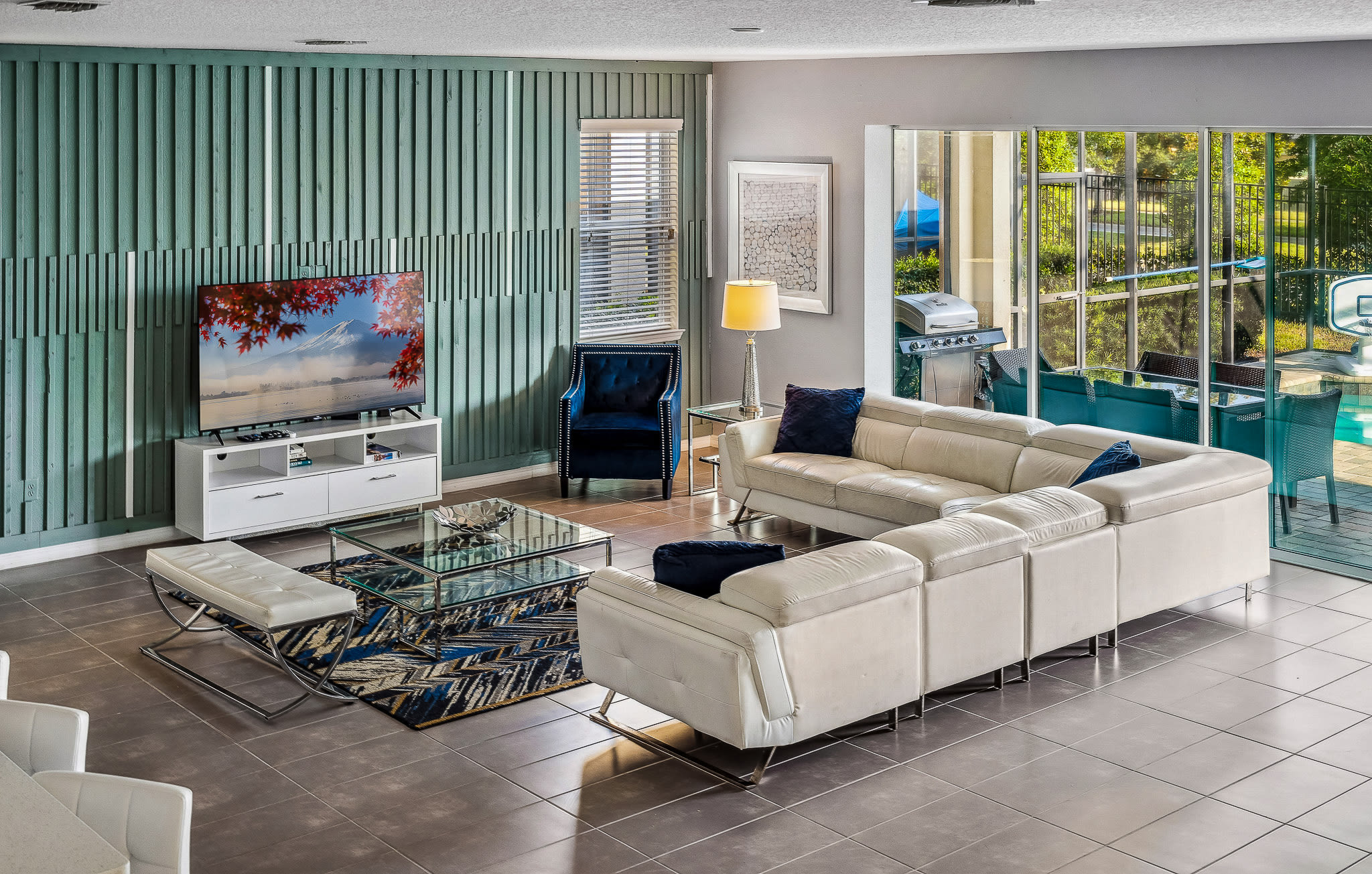 Open living area w/ plush seating and a large TV, ideal for movie nights together.