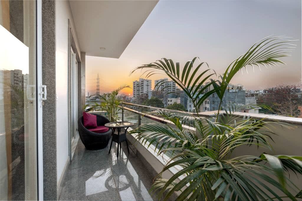 Step outside and savor the beauty of the world around you - where breathtaking views and fresh air create a peaceful escape, in the serene haven of your balcony.