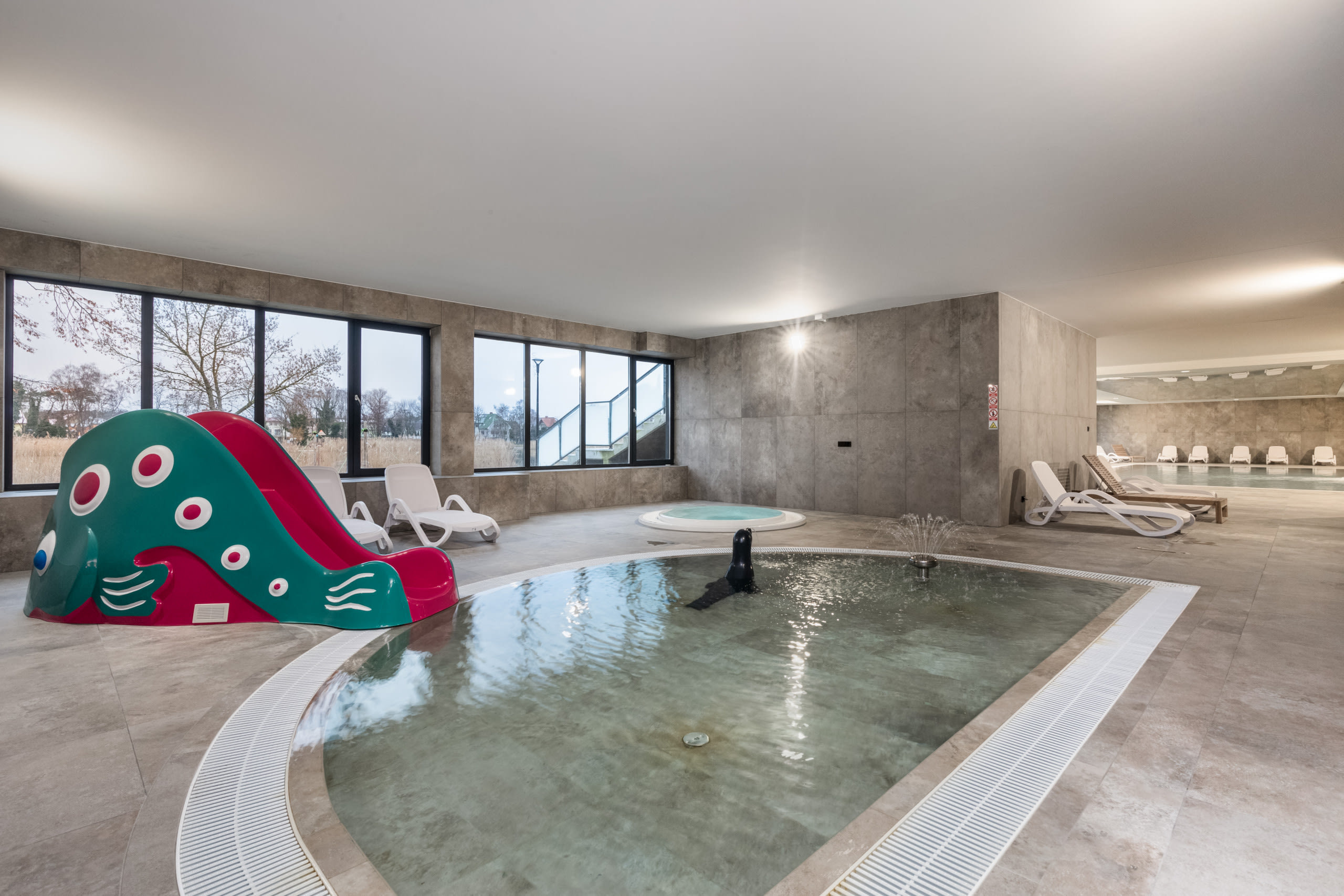 A hotel pool at a seaside apartment complex in Dziwnów